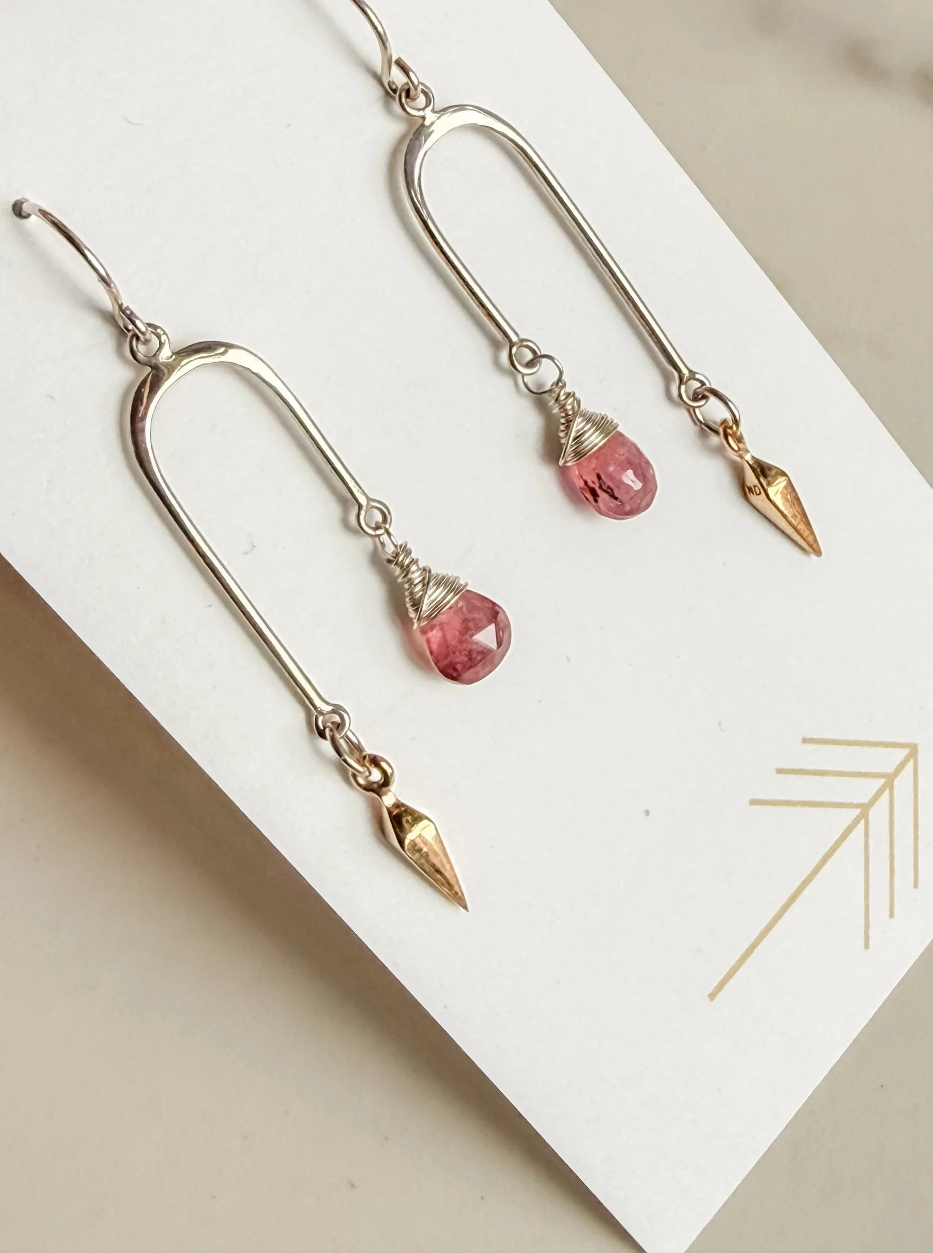 Gemstone Asymmetrical Arch with Bronze Dagger