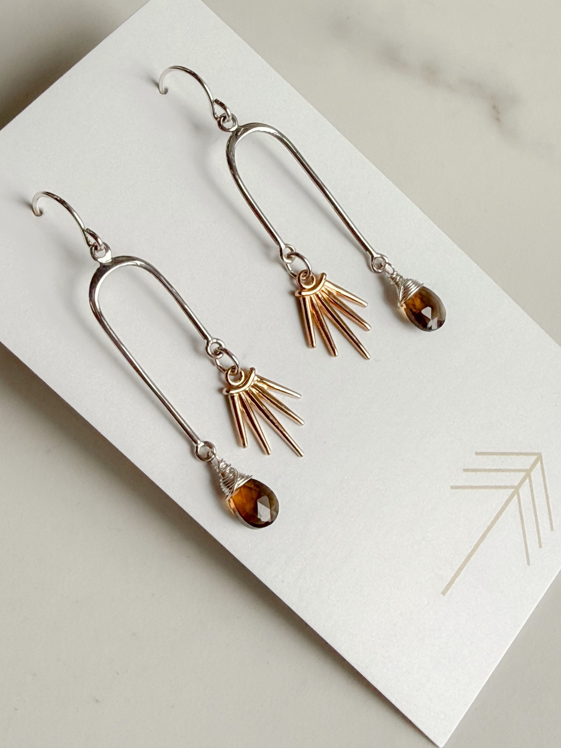 Gemstone Asymmetrical Arch with Bronze Sunburst