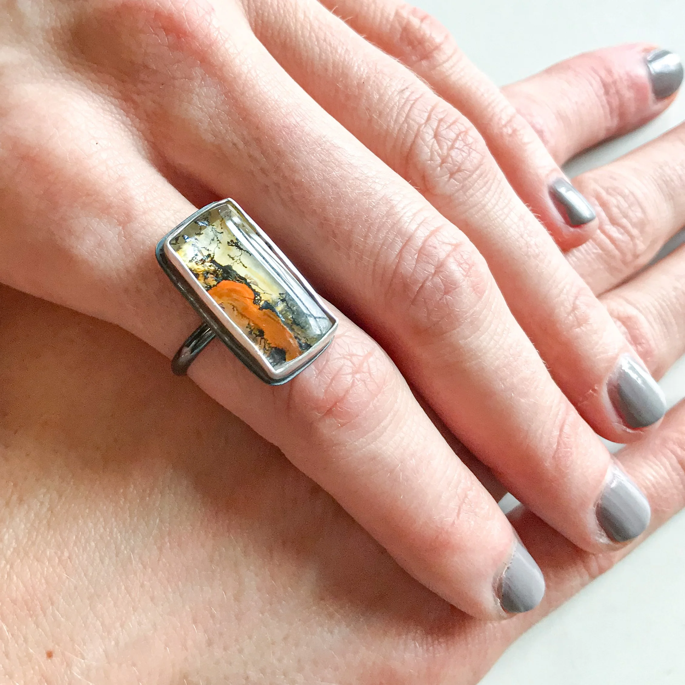 lava-waterfall-dendritic-quartz-ring-silver-rectangle-4-hand.JPG