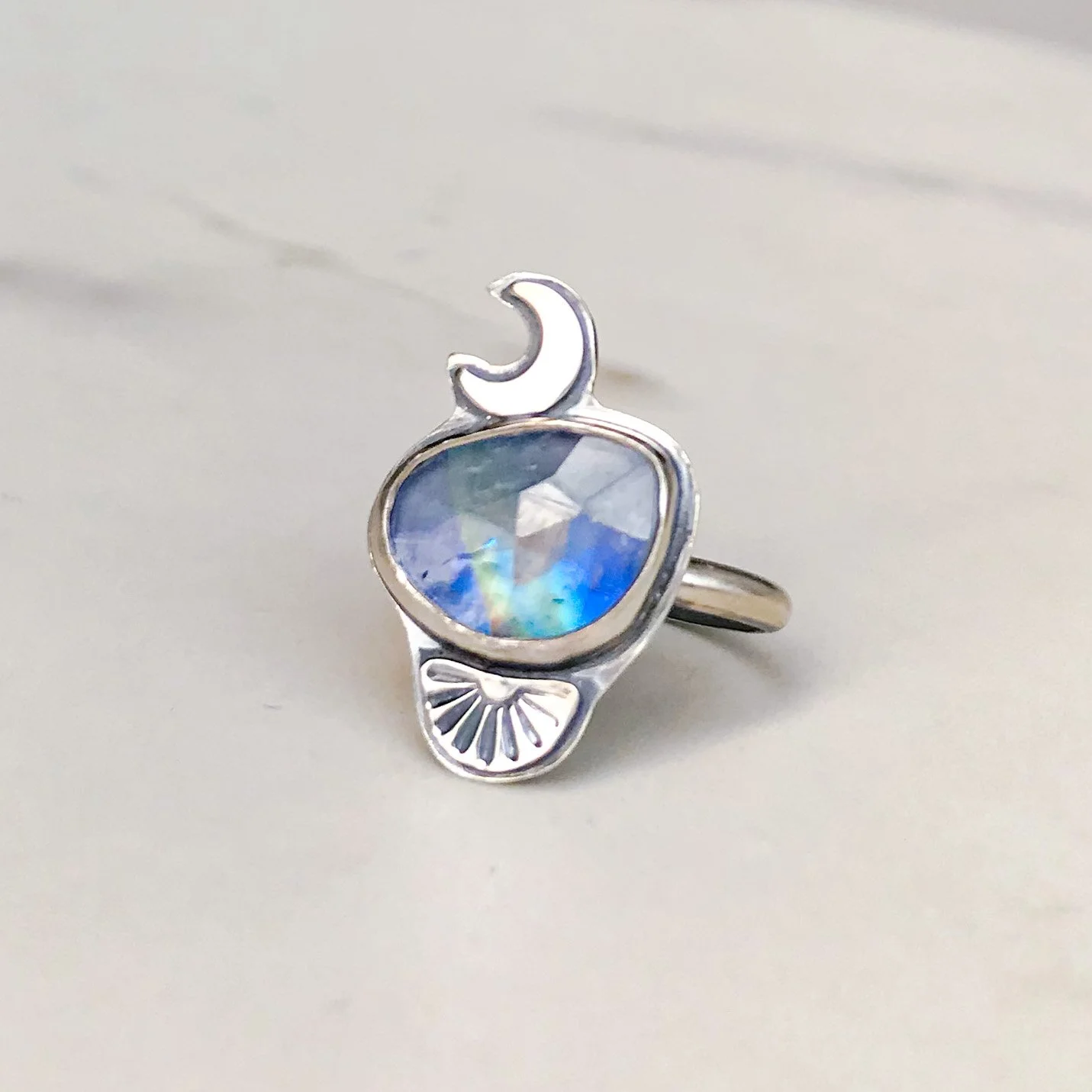 Moon stone ring with silver crescent and fan accents