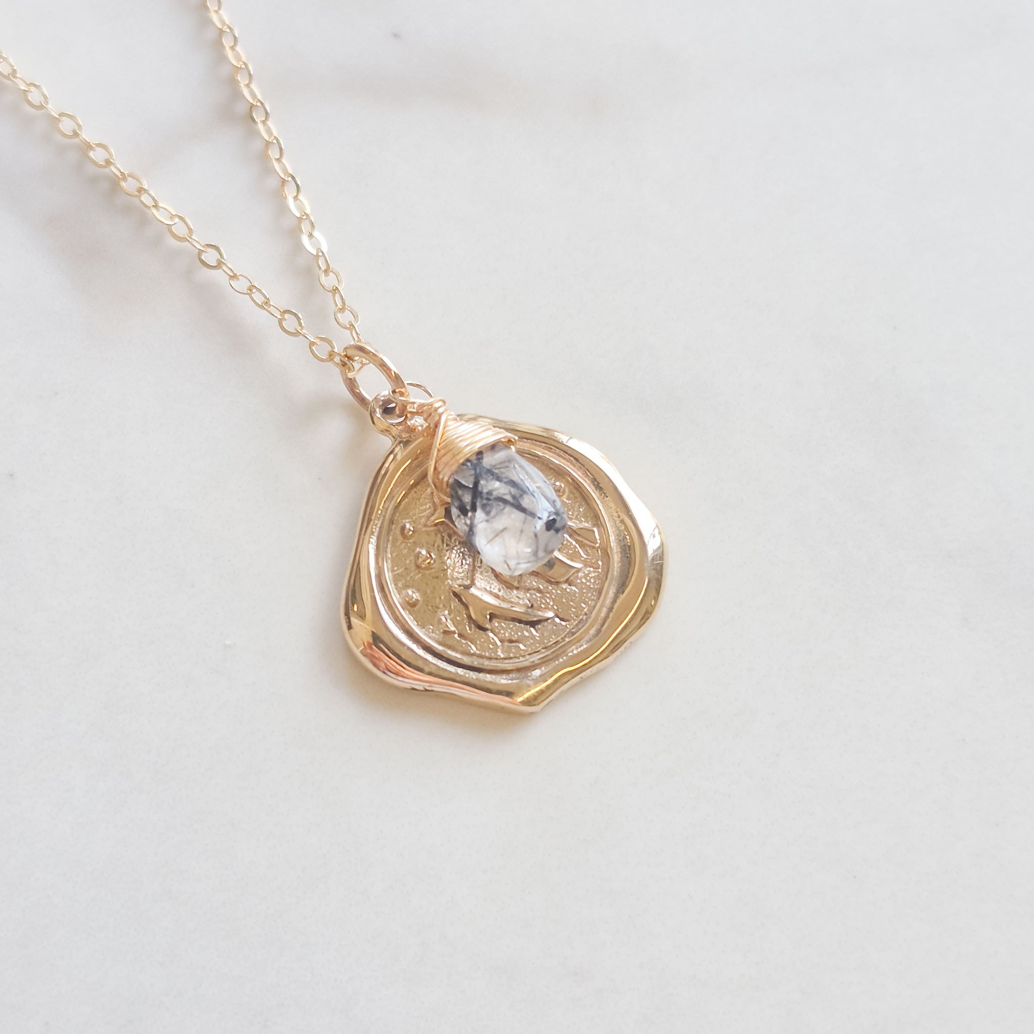 rutilated-quartz-mountains-necklace-bronze-wax-seal-1.jpg