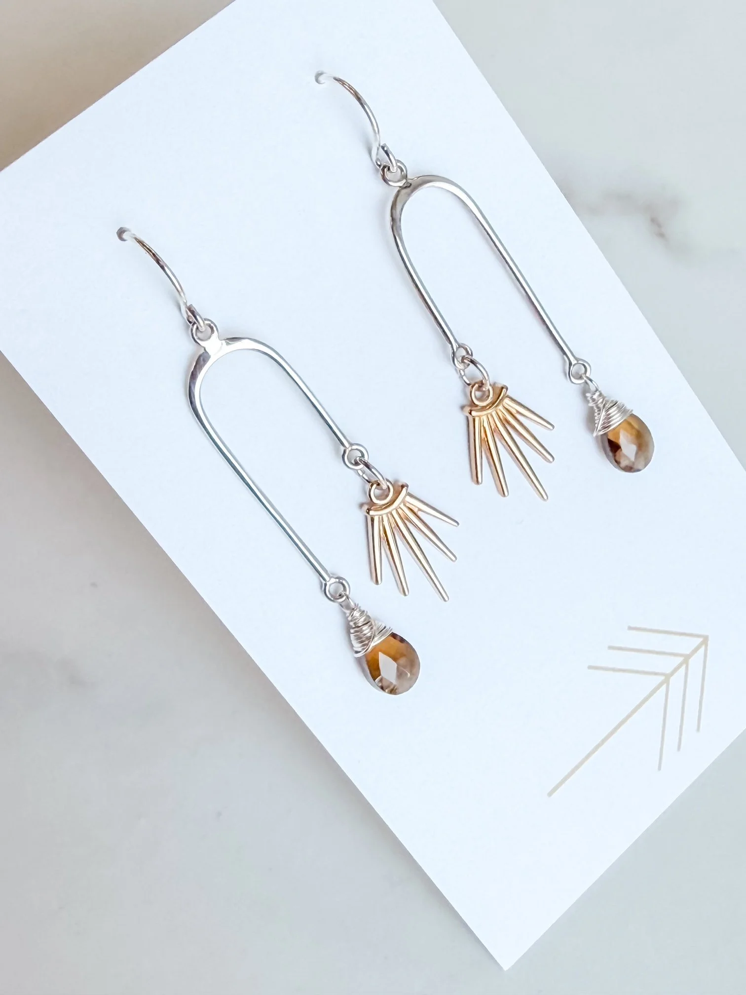 Gemstone Asymmetrical Arch with Bronze Sunburst