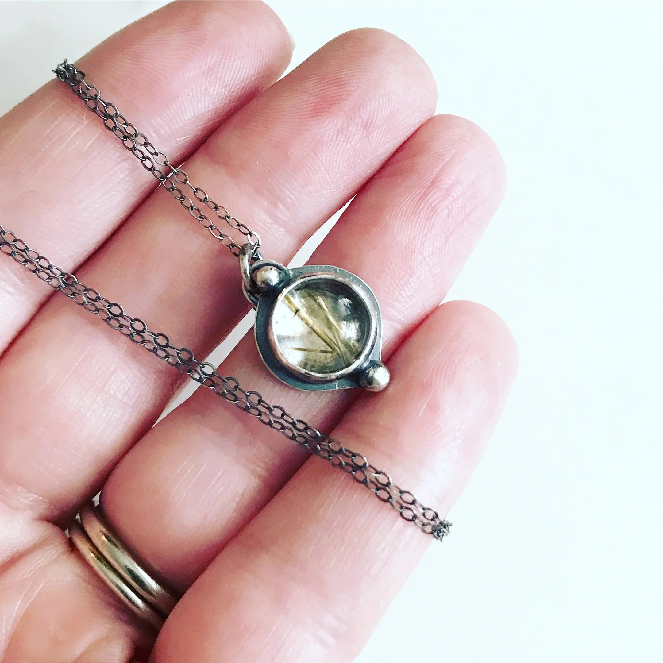 caro designs - rutilated quartz necklace.JPG