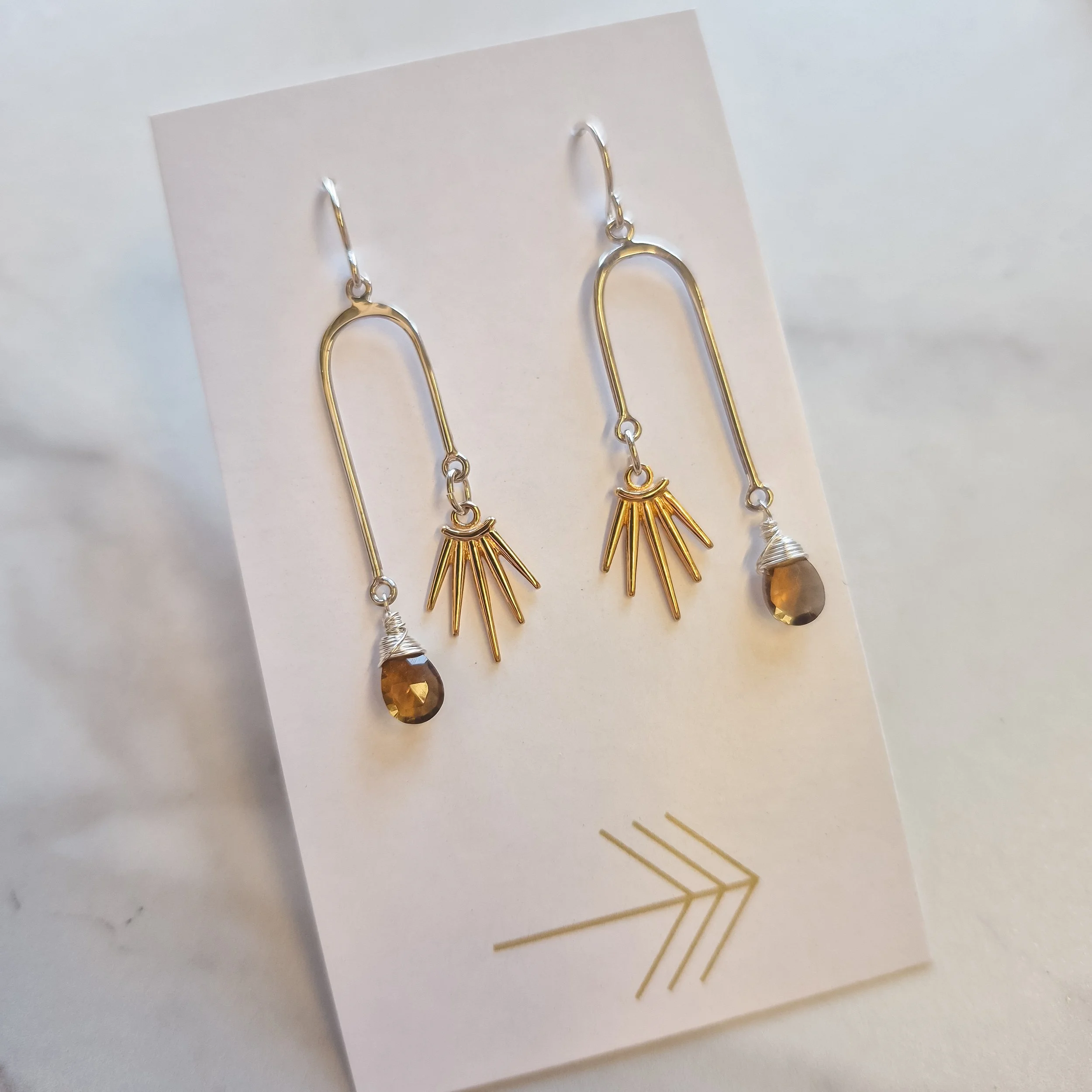 Gemstone Asymmetrical Arch with Bronze Sunburst