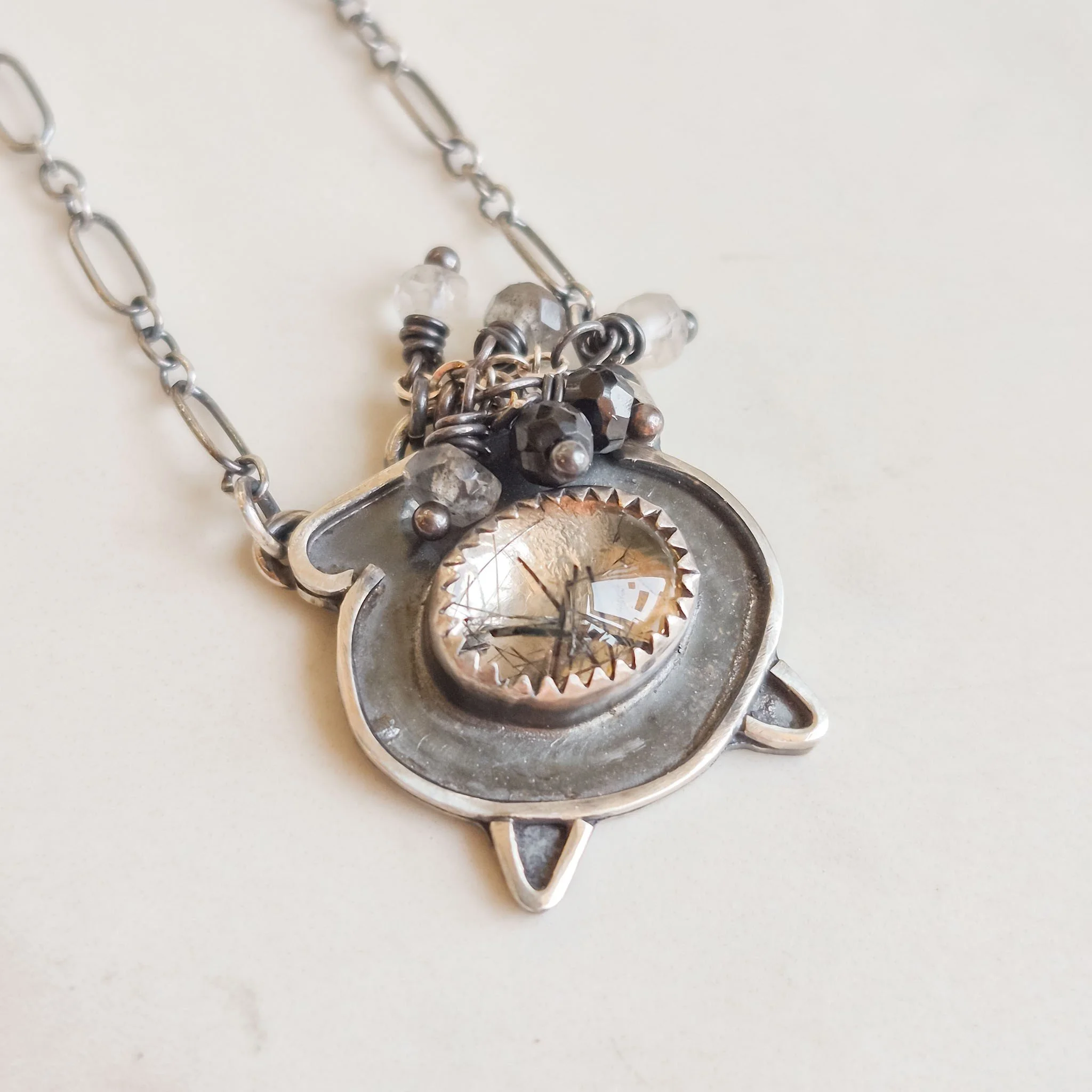 oxidized silver cauldron bubbling over with gemstone beads