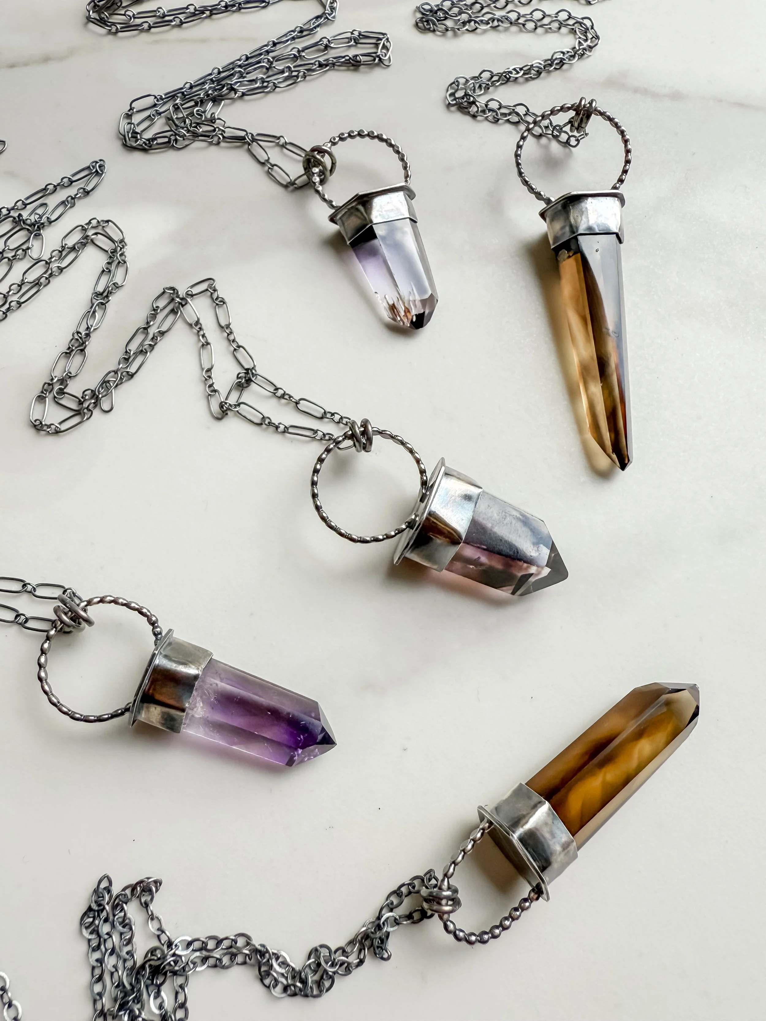 smoky-citrine-phantom-amethyst-point-group-1.JPG