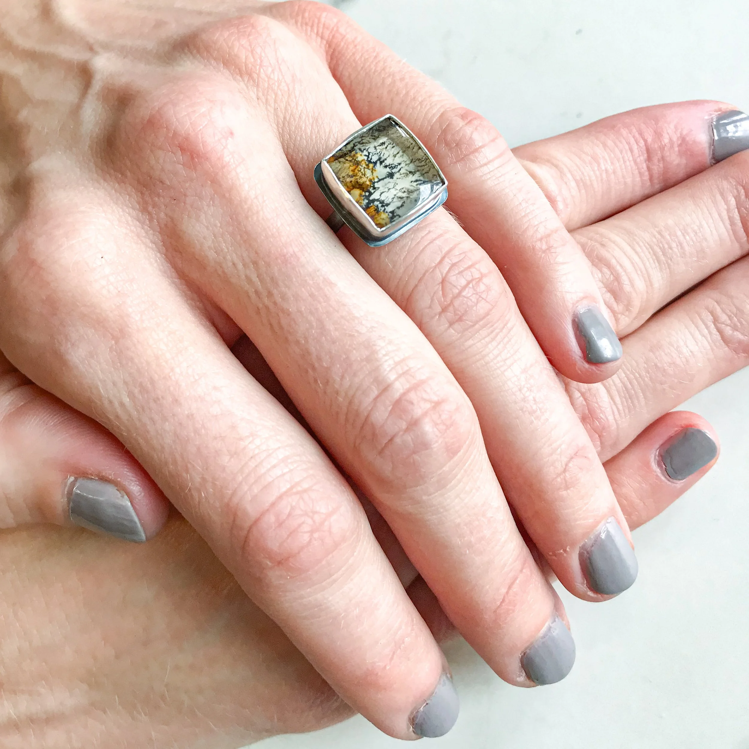bonfire-nights-dendritic-quartz-ring-silver-square-6-hand.JPG