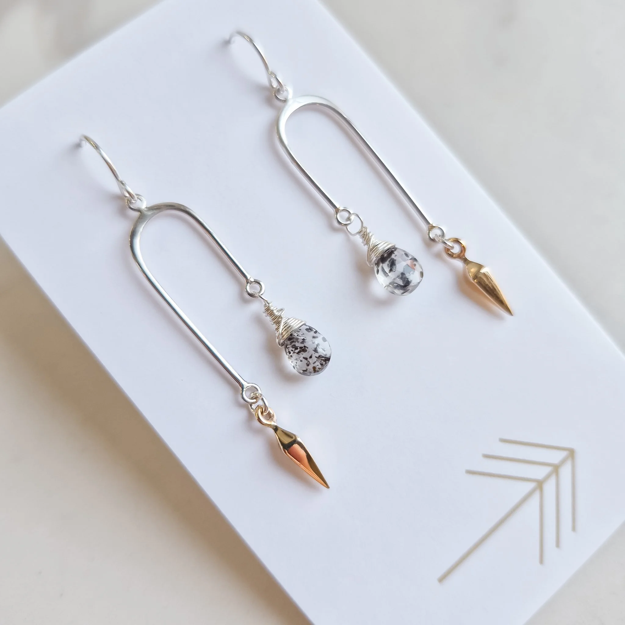 Gemstone Asymmetrical Arch with Bronze Dagger