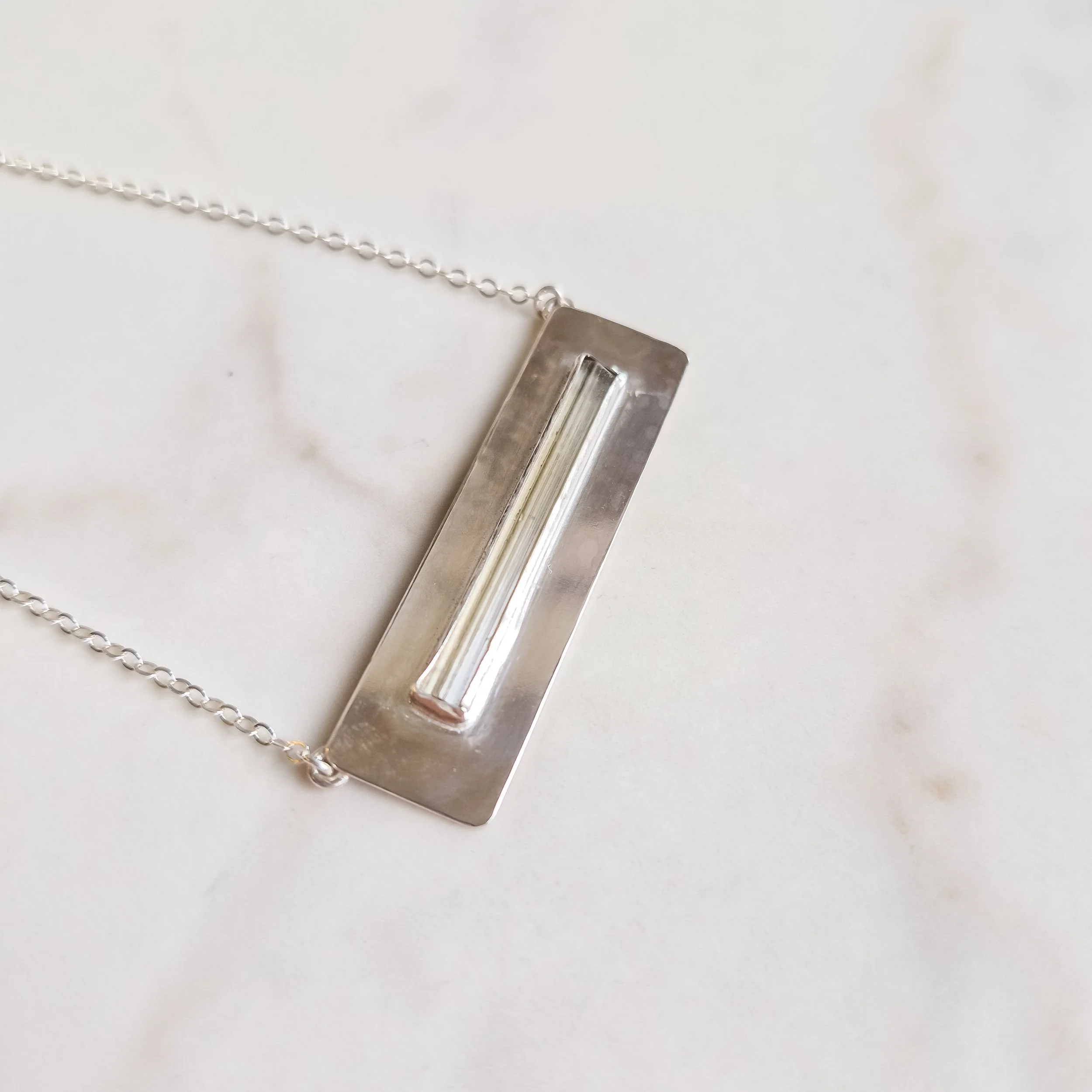 tourmaline-clear-bar-necklace-june-2026-1.jpg
