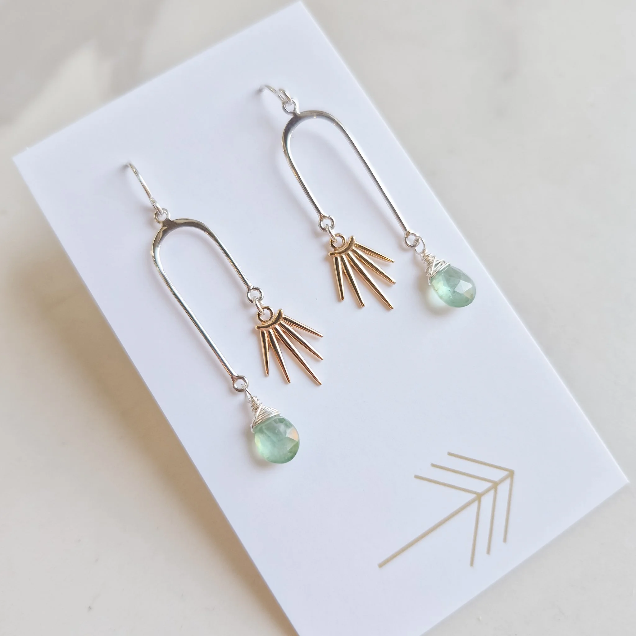 Gemstone Asymmetrical Arch with Bronze Sunburst