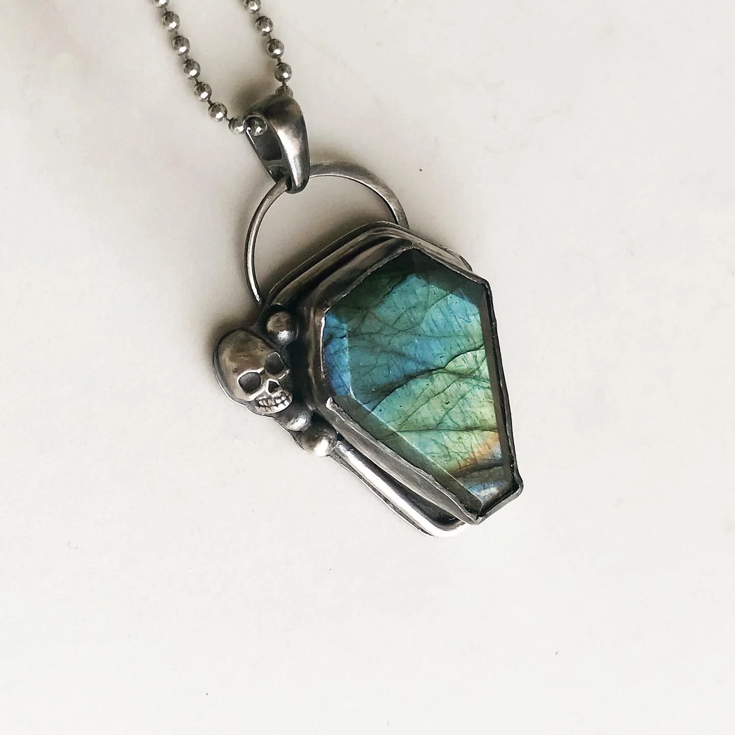 Labradorite coffin necklace in silver with skull embellishment