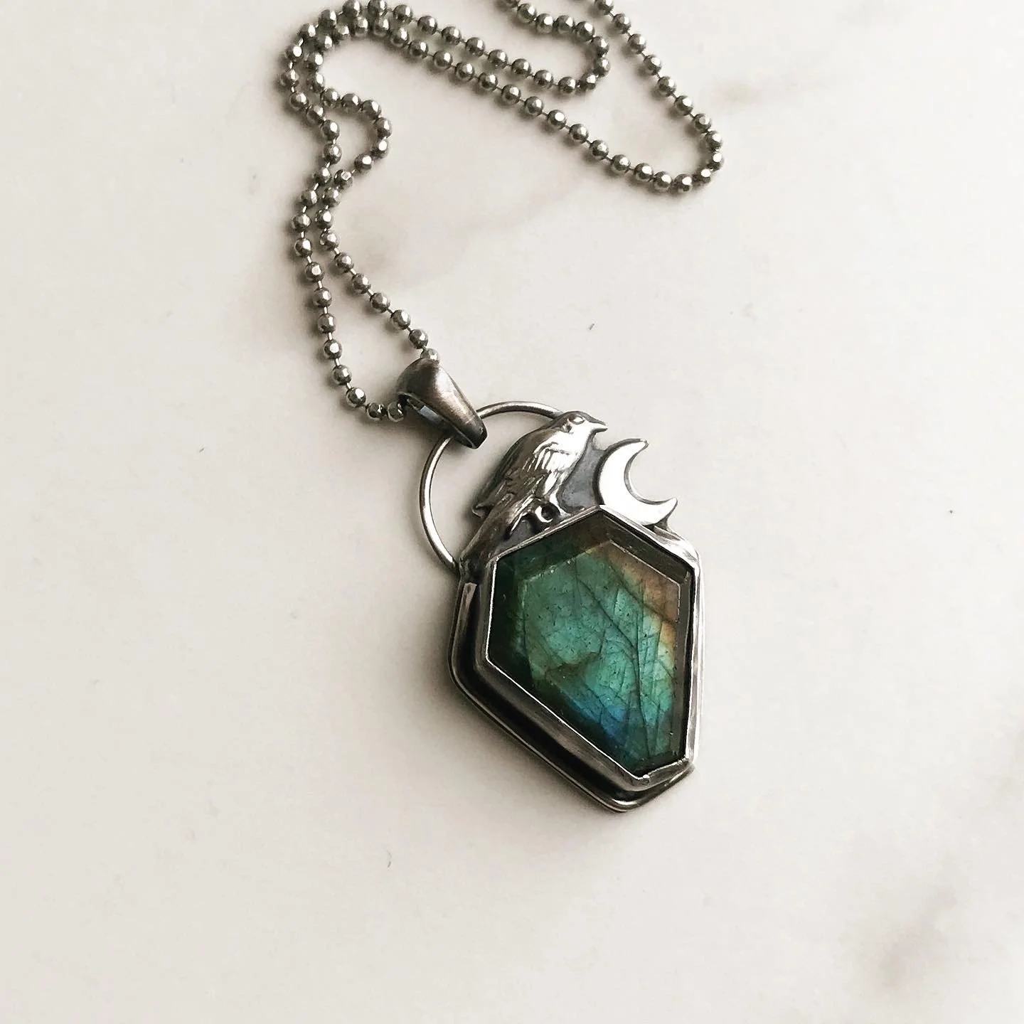 Labradorite coffin necklace in silver with crow & crescent embellishment