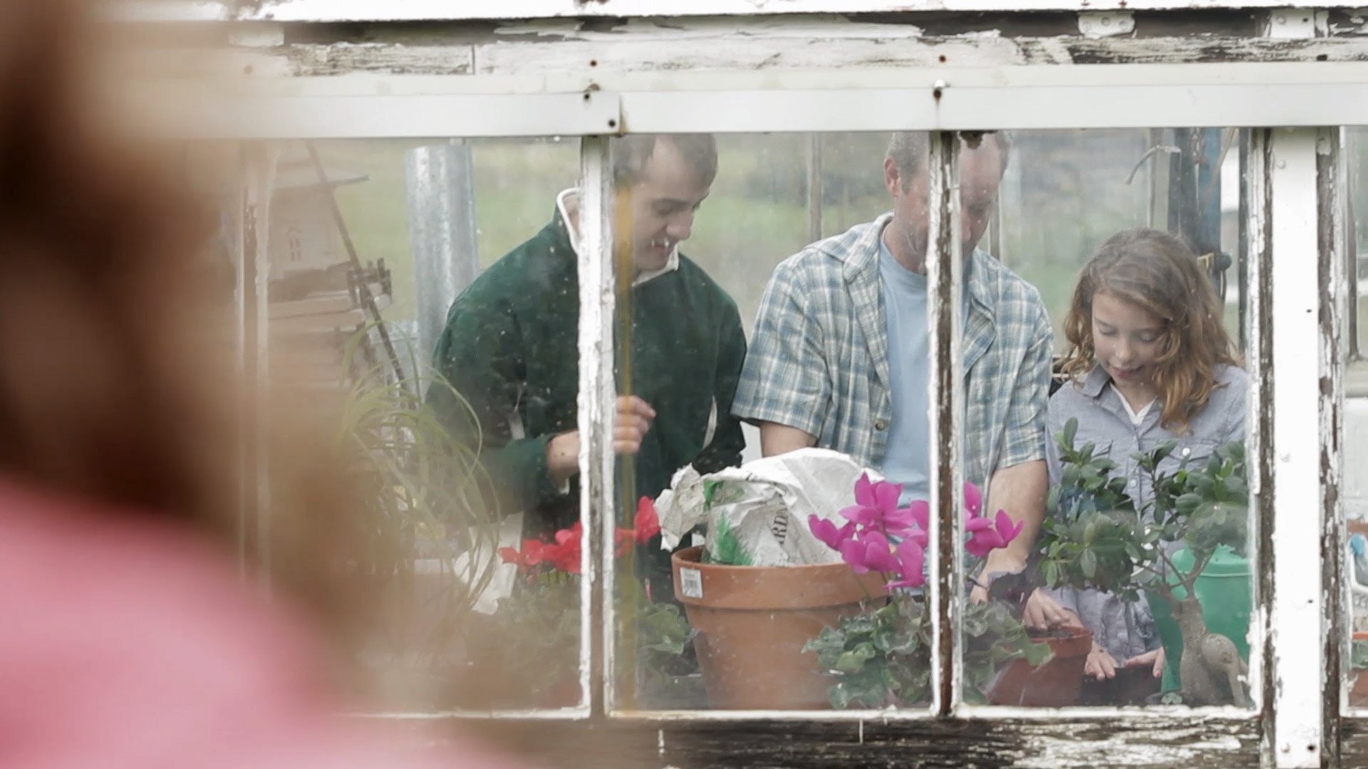 family in greenhouse.jpg
