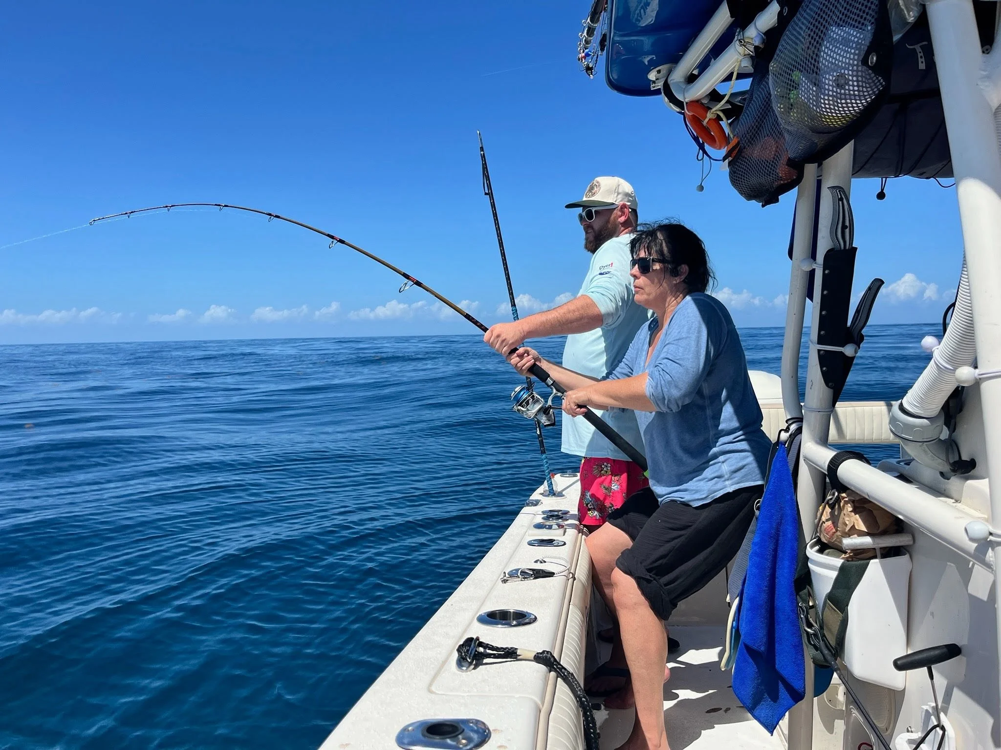 Fighting big shark on king fish rod