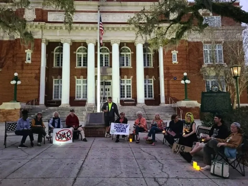 Community Holds Candlelight Vigil at Brookville,FL Courthouse to Protest Iran Conflict