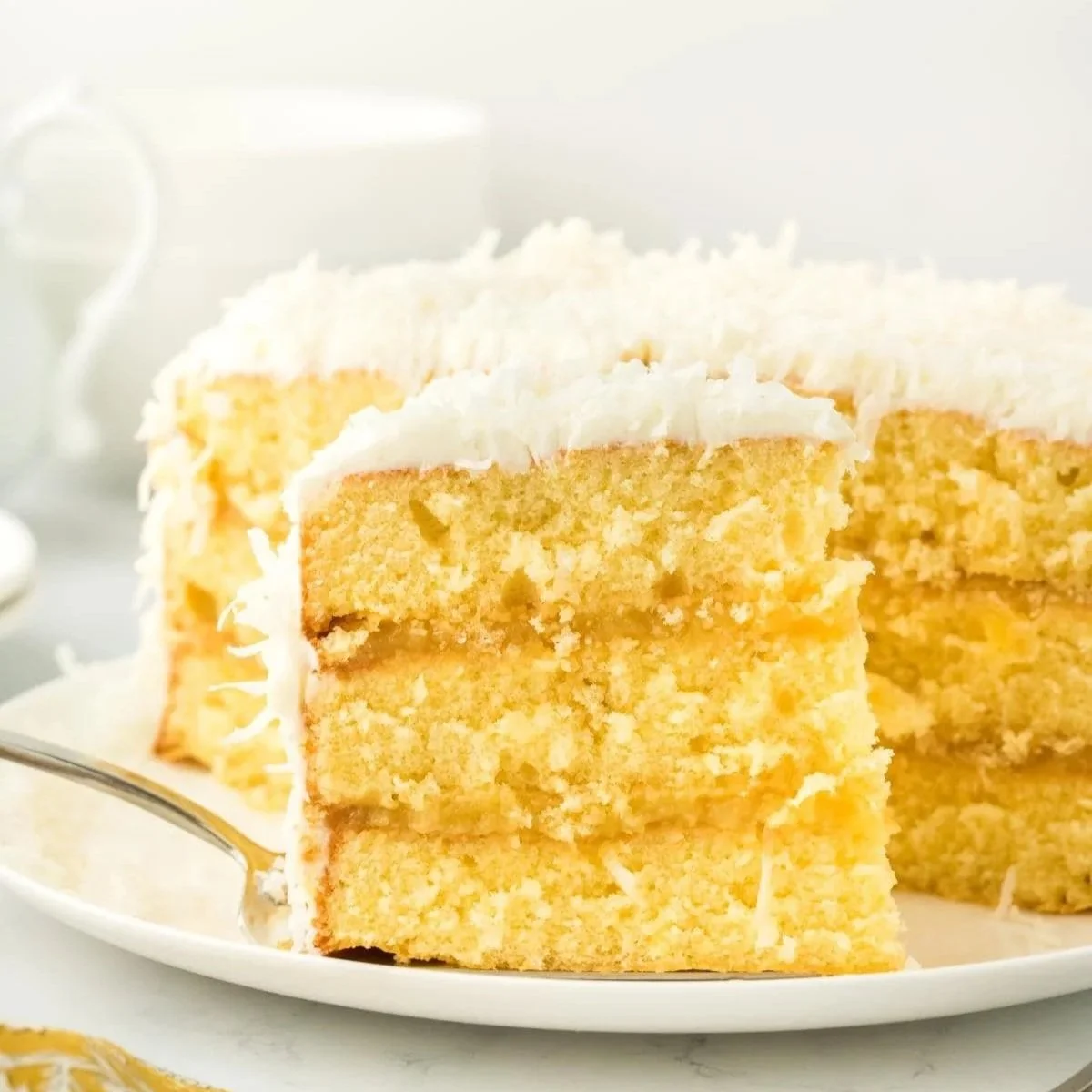 PINEAPPLE CAKE
Think of our classic coconut cake, but made with pineapple instead of coconut. Still moist
and delicious!