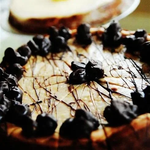 CHOCOLATE SWIRL MACADAMIA NUT CHEESECAKE