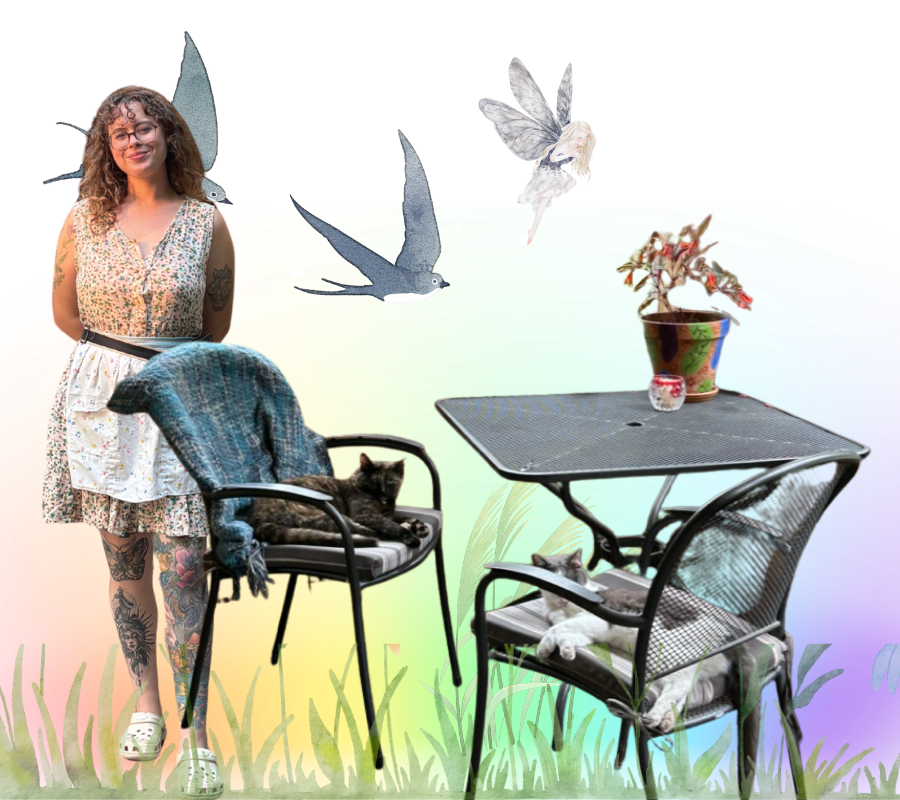 A woman with tattoos standing next to a black chair with a black cat lying on it, a glass-top table with a cat sleeping underneath, and colorful, digital rainbow background with birds, a butterfly, a small potted plant, and grass.