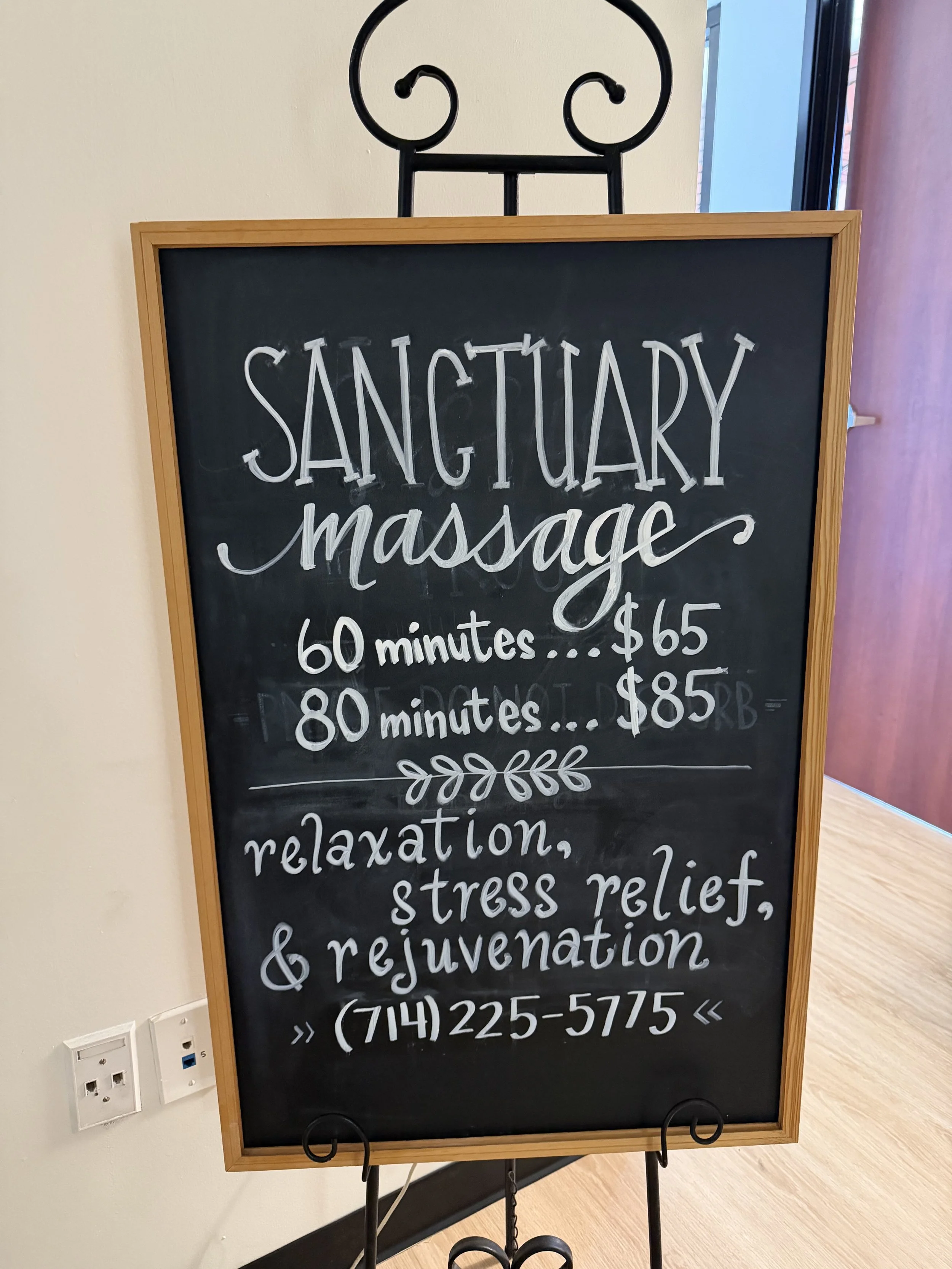 Sanctuary Massage logo featuring serene imagery, located in San Antonio, Texas.