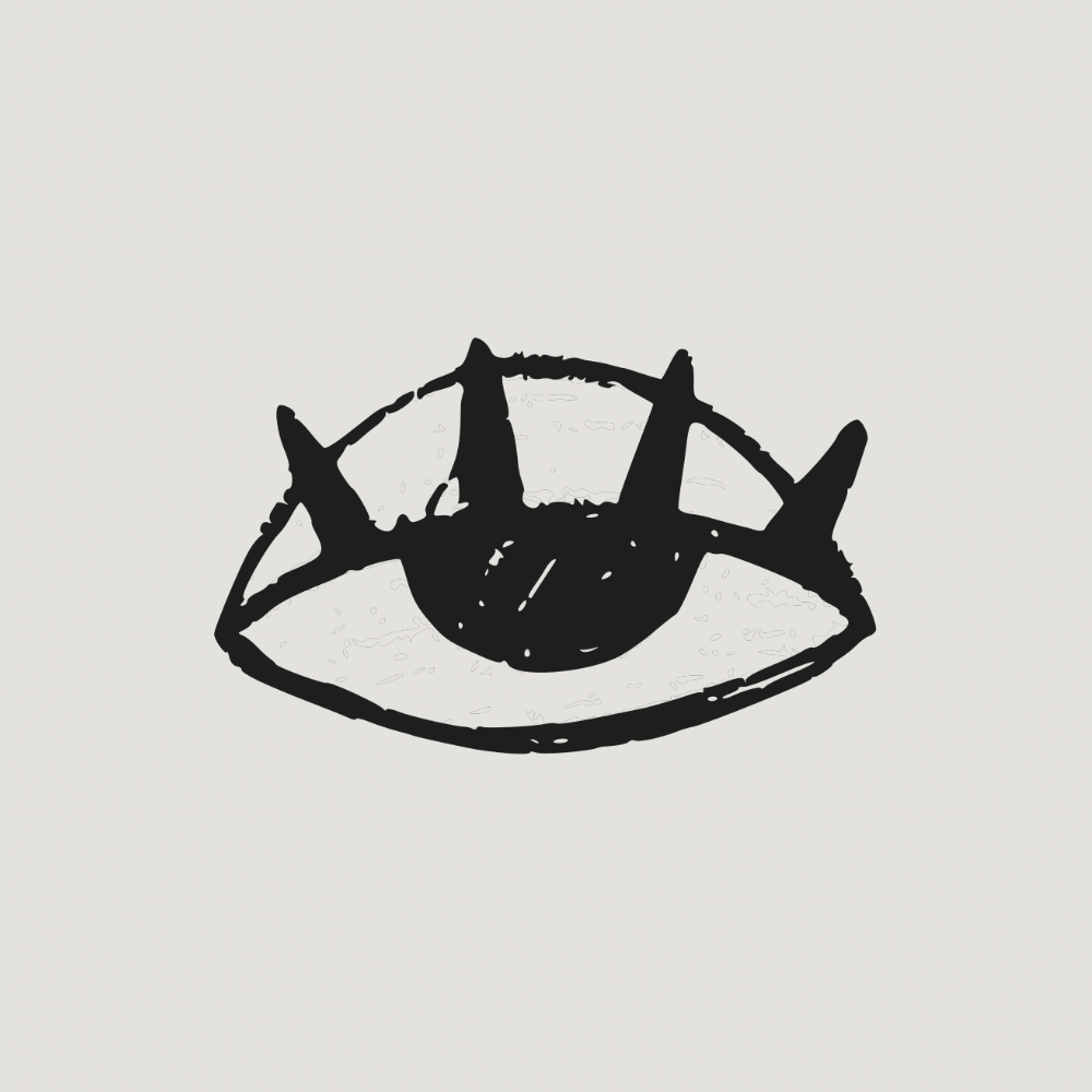 A black and white drawing of an eye adorned with sharp spikes, emphasizing a striking and unusual design.