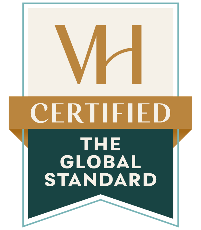 Vh Certified logo with the text "The Global Standard" on a ribbon banner.