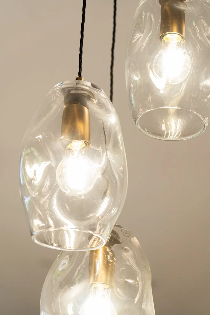 3 lights hanging from roof