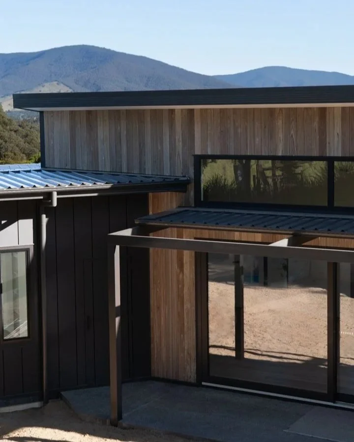 exterior of house with mountains in the distance