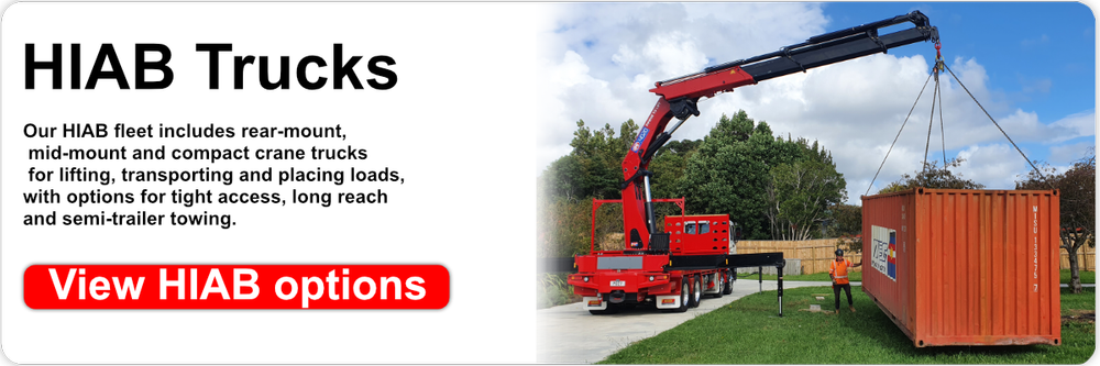 Banks HIAB crane truck lifting a shipping container into place