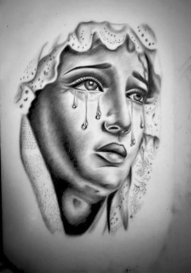 Black and white portrait of a woman with tears streaming down her face, wearing a lace head covering.