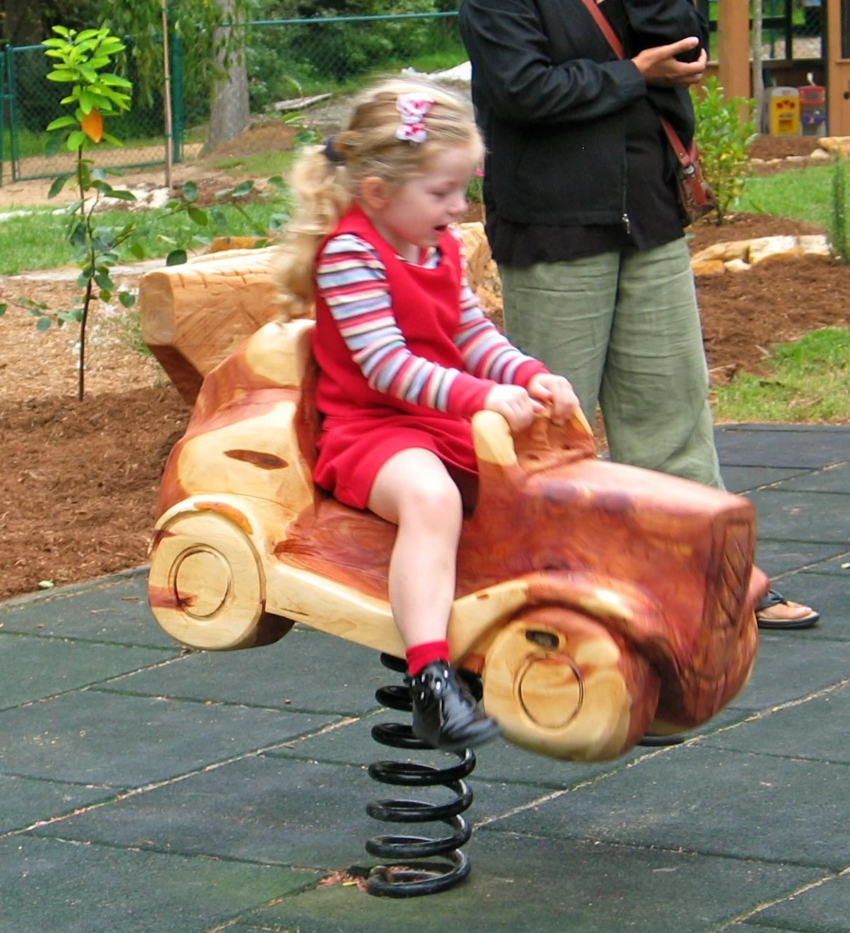 girl on springer Kiwanis.JPG