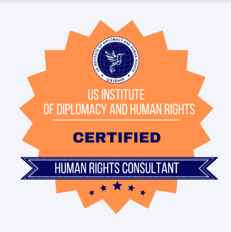 Certification badge from the US Institute of Diplomacy and Human Rights, indicating a certified human rights consultant, with an orange starburst background and blue and white text.