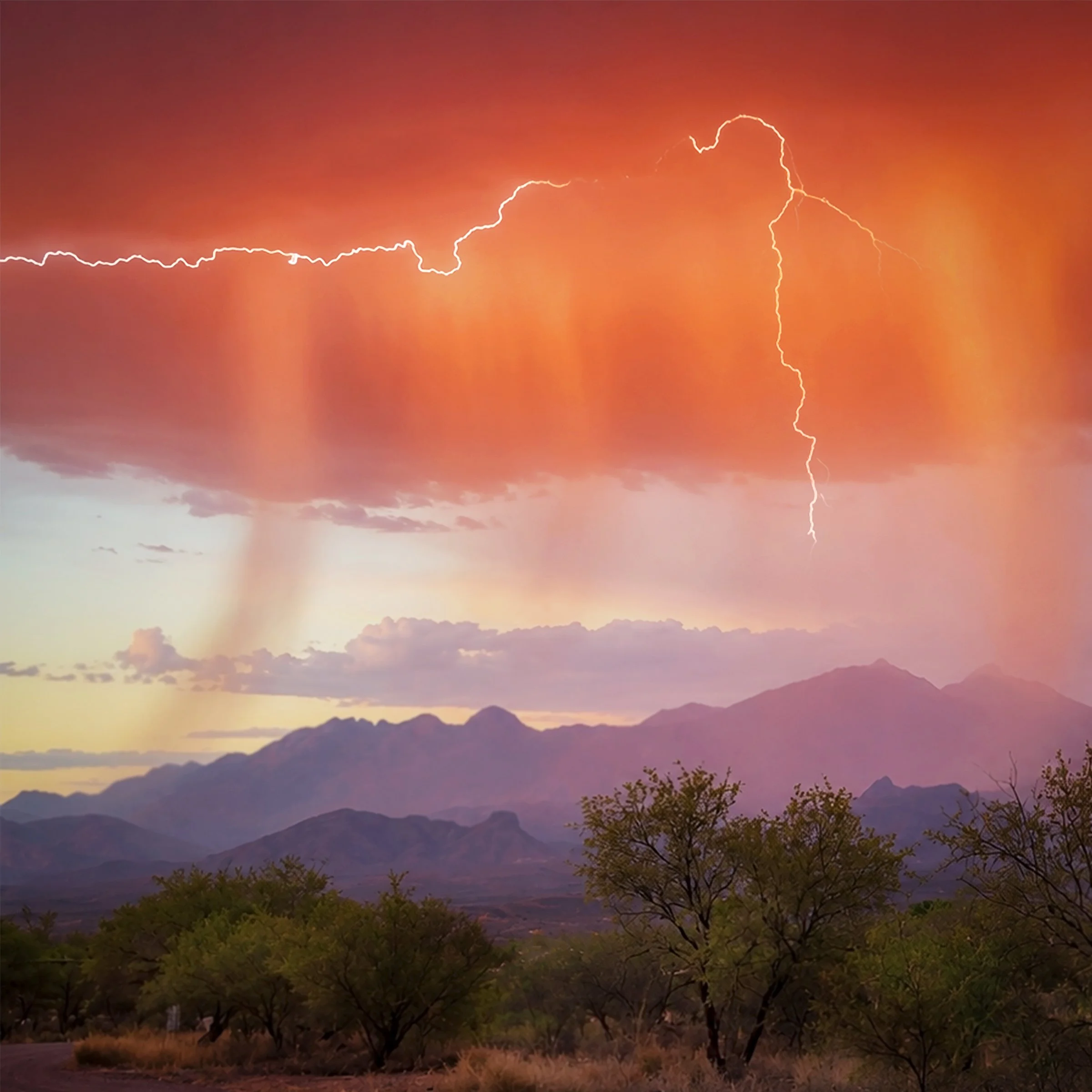 "Fire In The Rain" 12 x12 metallic print with glossy 1/4' acrylic face mount