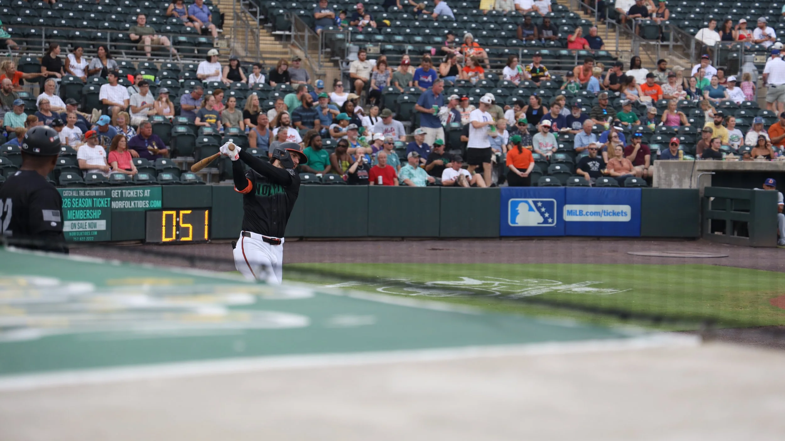 Norfolk, Virginia, 26 June 2026 - Getting Loose: Dylan Beavers prepares for his first at-bat. Photo: Jesse Ankney