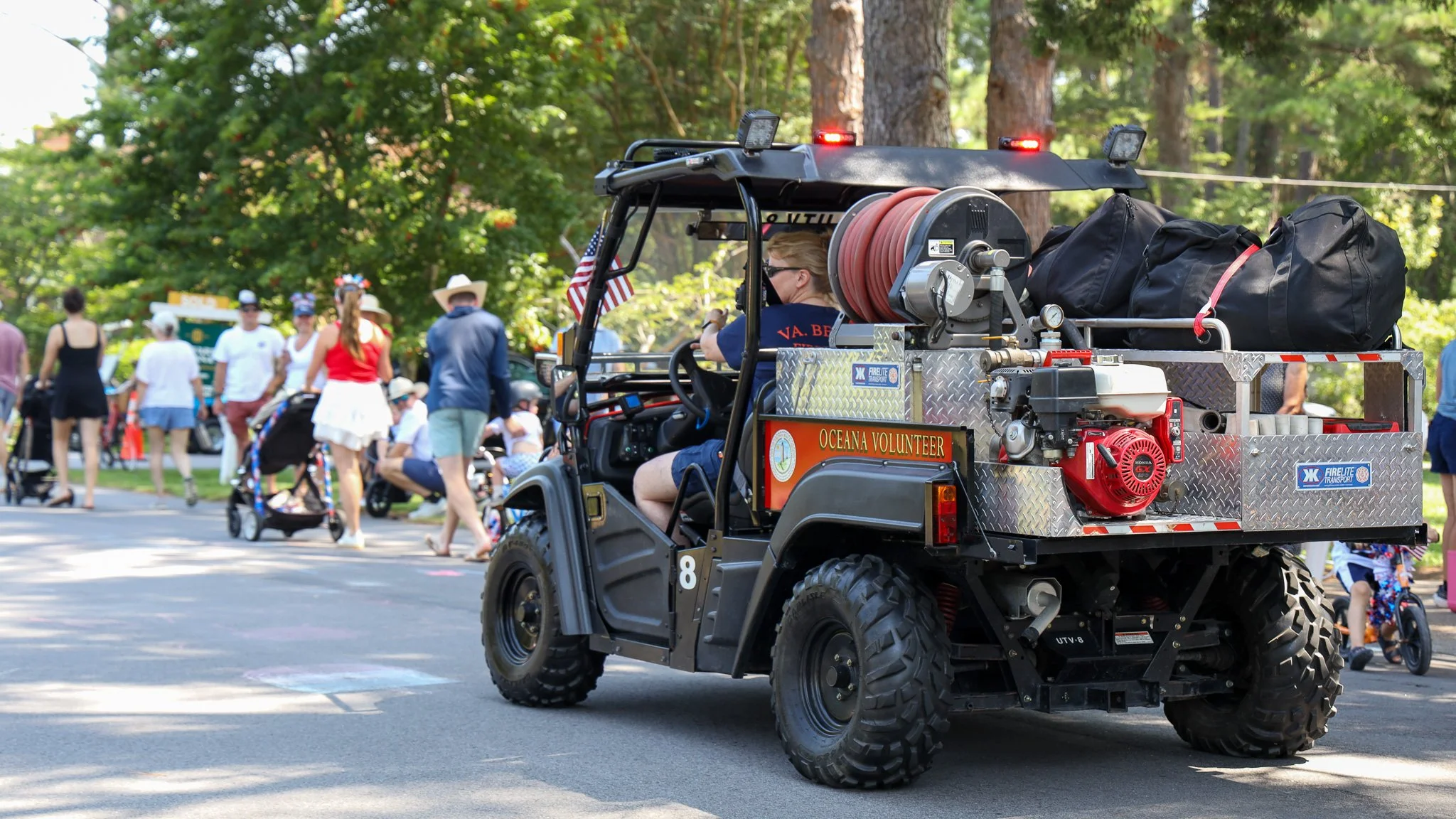 Virginia Beach, Virginia, 4 July 2026 -- Cub Cadet 8 brings up the rear of the Alanton neighborhood Independence Day parade. Photo: Jesse Ankney.