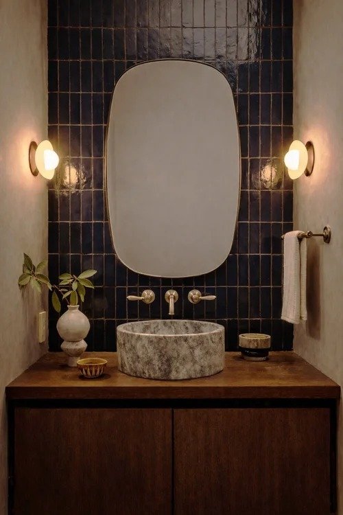 imgi_5_Powder+room+-+travertine+sink+basin%2C+waterworks+faucet%2C+roman+clay%2C+zellige+tile%2C+navy+tile%2C+walnut+vanity.jpg