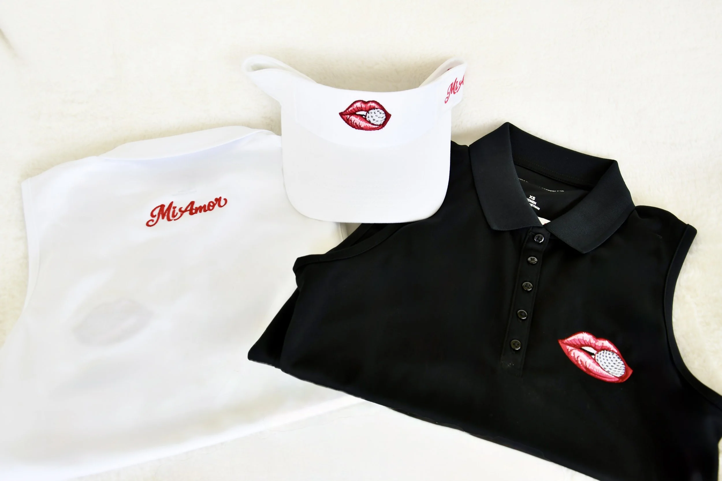 Black and White Folded Golf Tank with Golf Visor.JPG