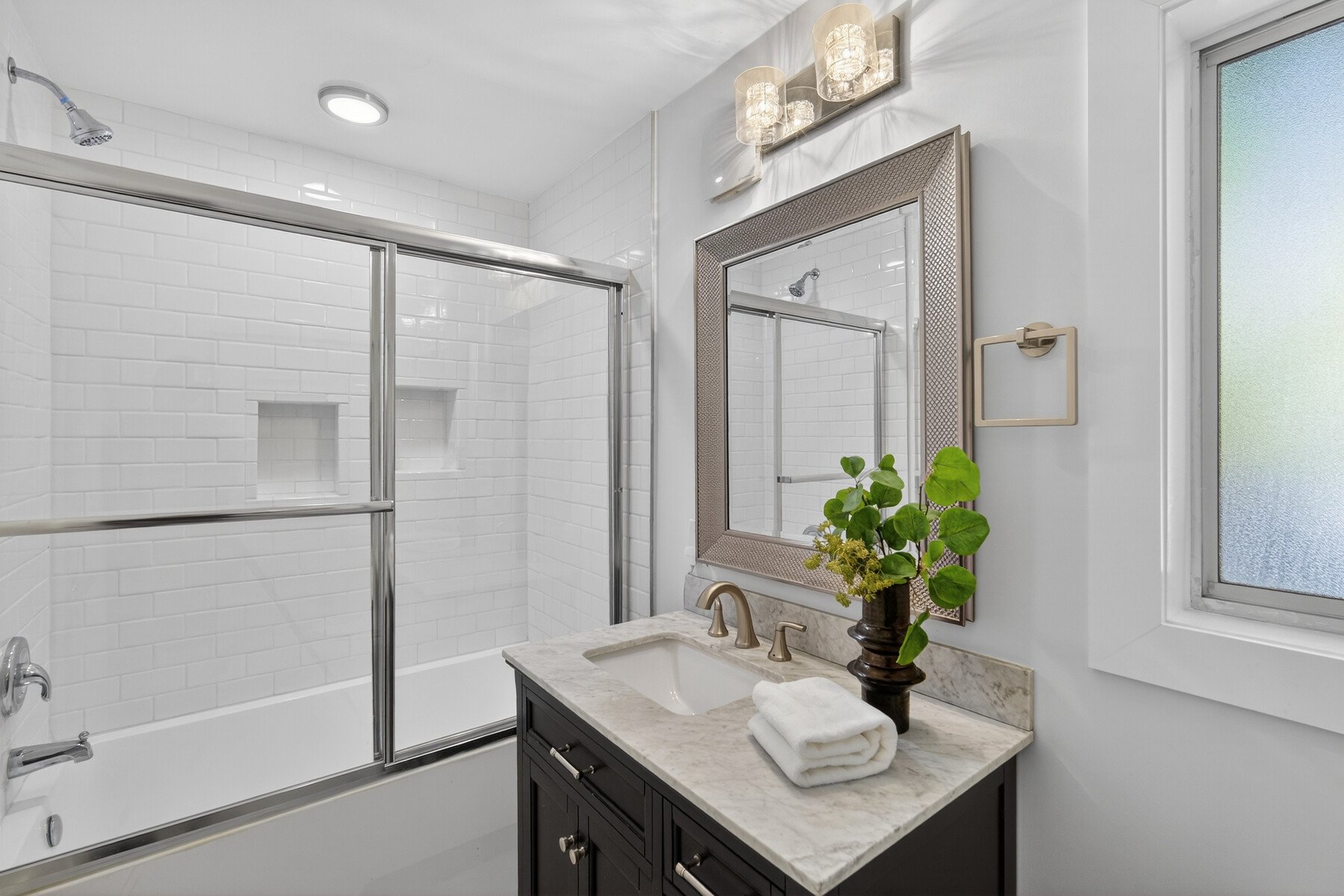 Upstairs guest bathroom with shower tub combo