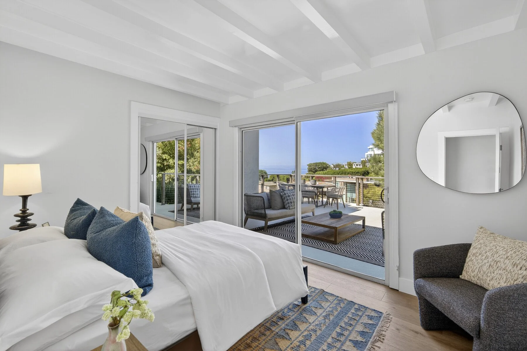 Ocean view guest bedroom with terrace.