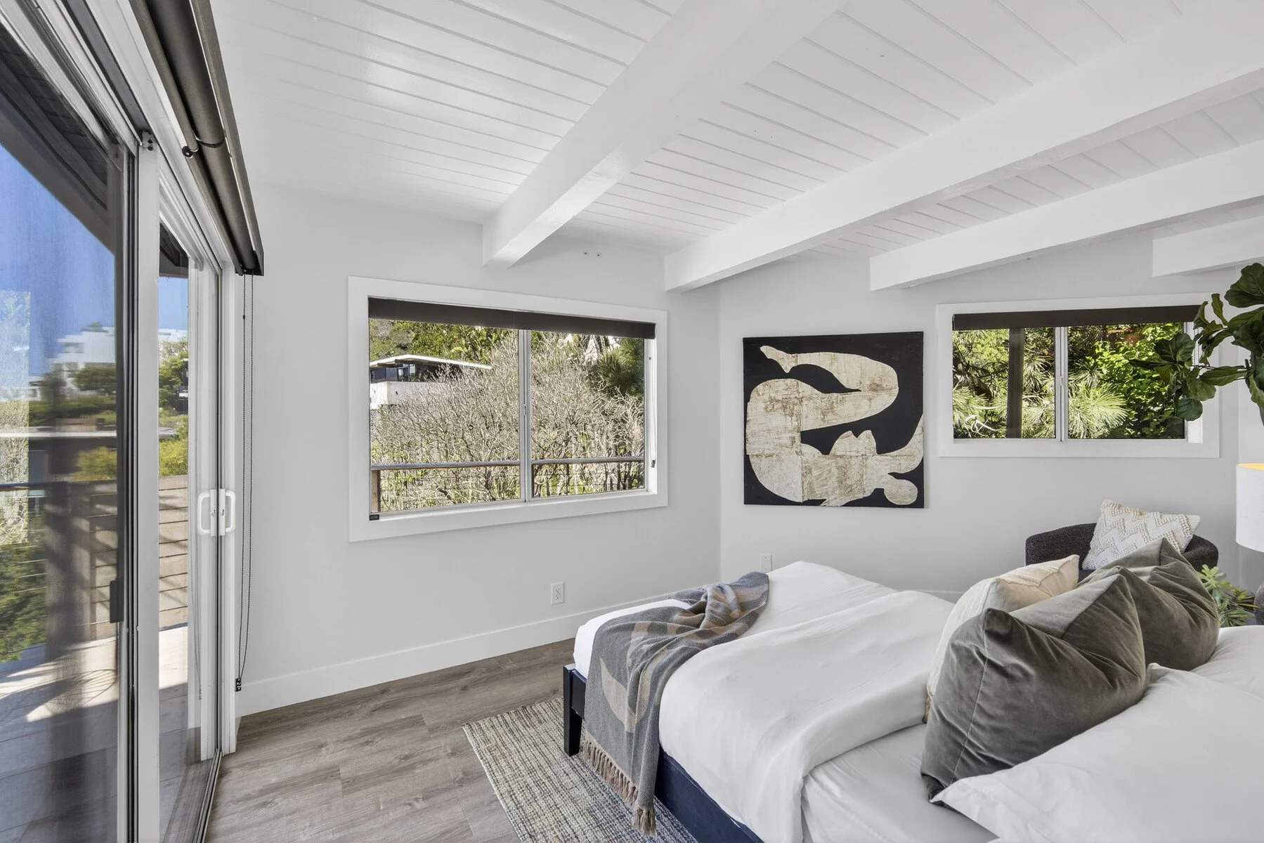 Downstairs ocean view bedroom with ensuite bathroom and walk-in closet