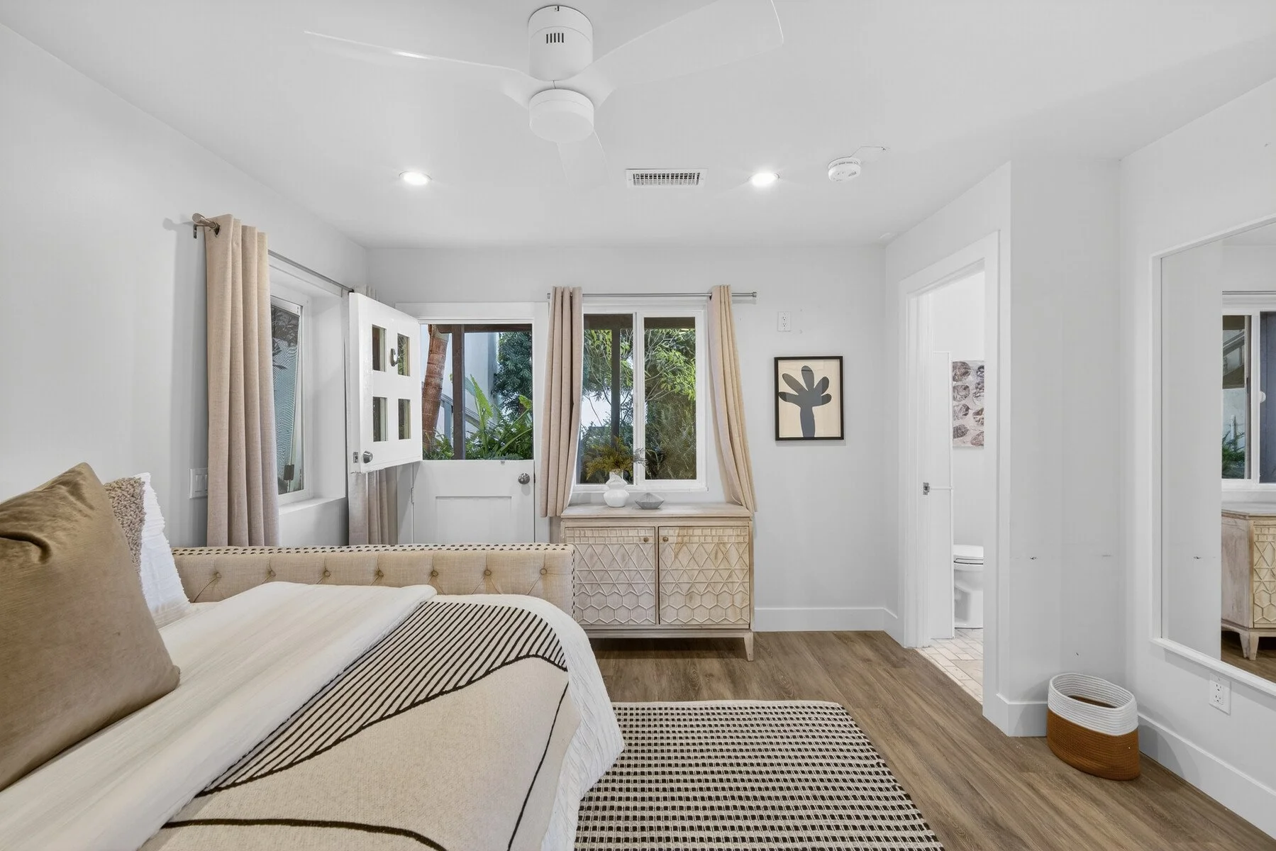Downstairs guest bedroom with ocean view terrace. 