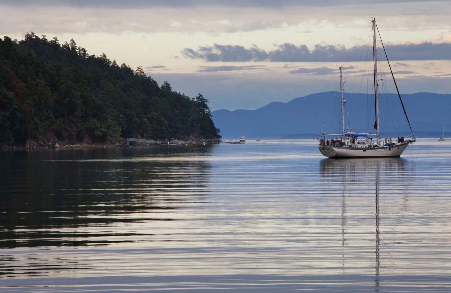 Sailboat on the water on the North Shore, symbolizing the peace achieve with working with a psychologist in North Vancouver