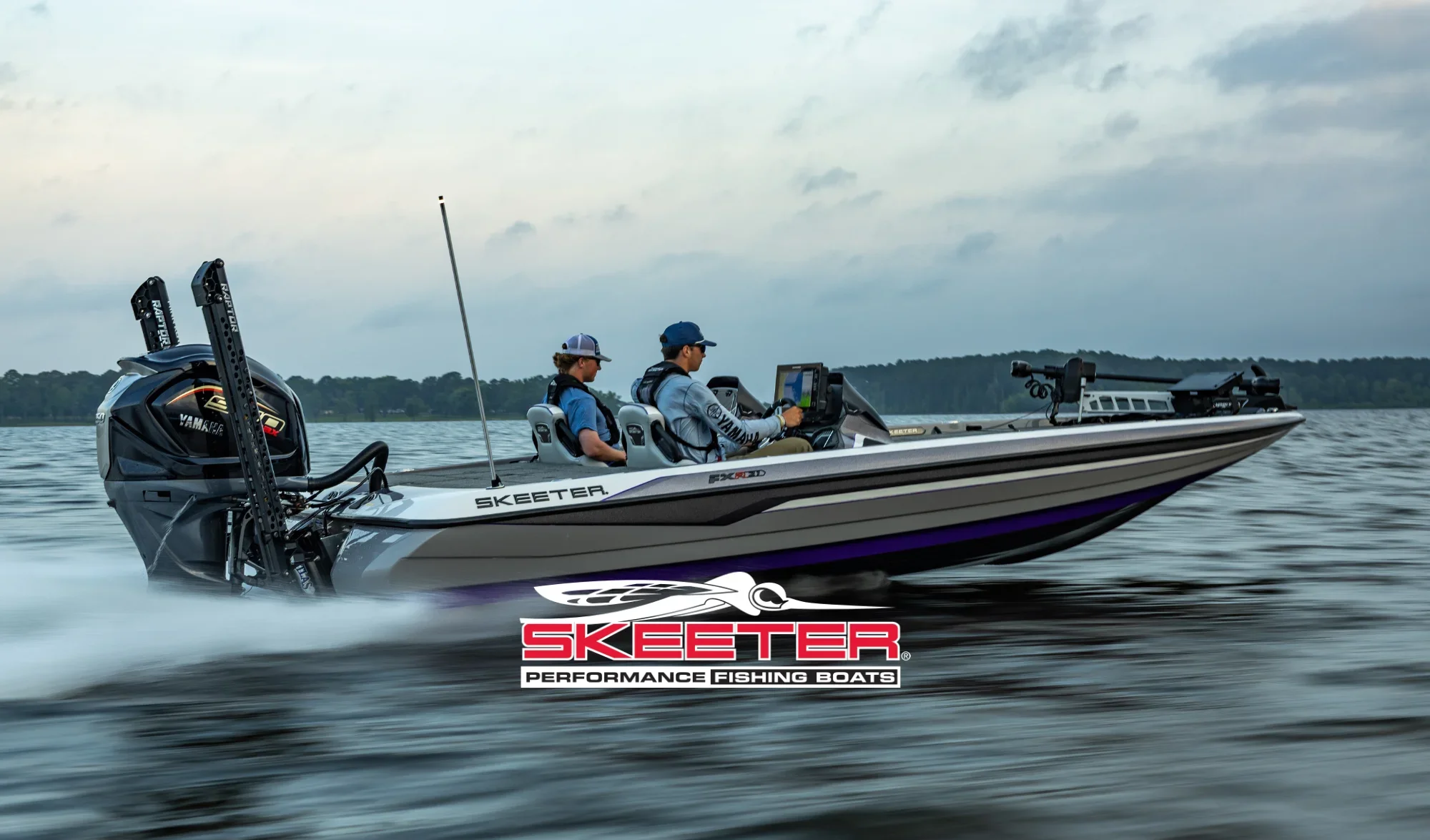Skeeter fishing boat moving across the water with two anglers seated inside.