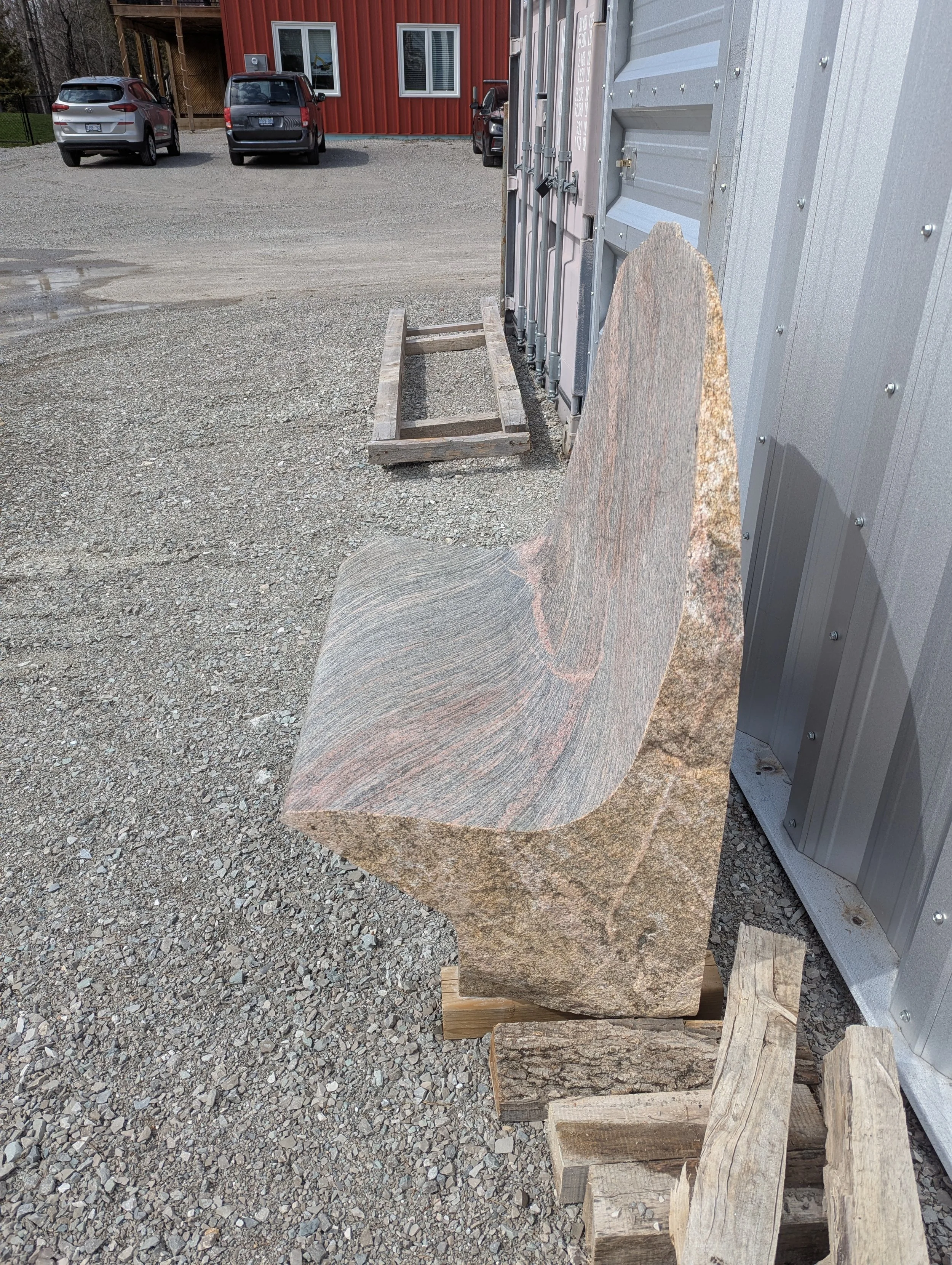 High backed natural granite bench