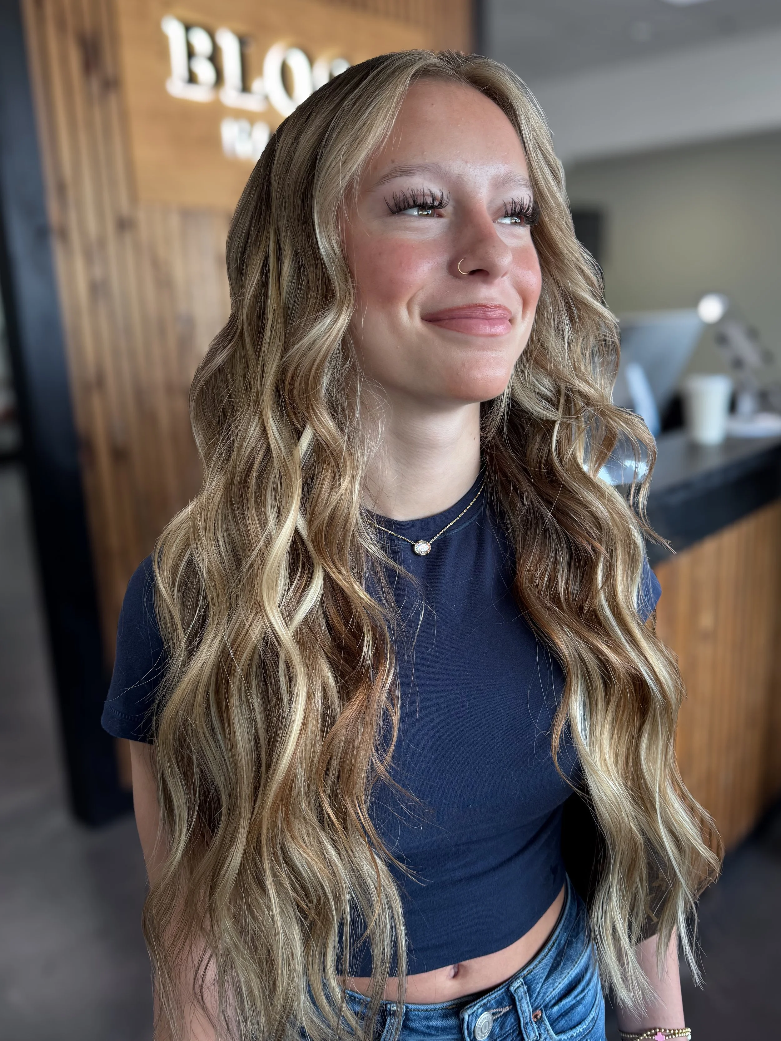 After 22 inch blonde Harper Ellis Hair Co. hair extensions for customized length and fullness