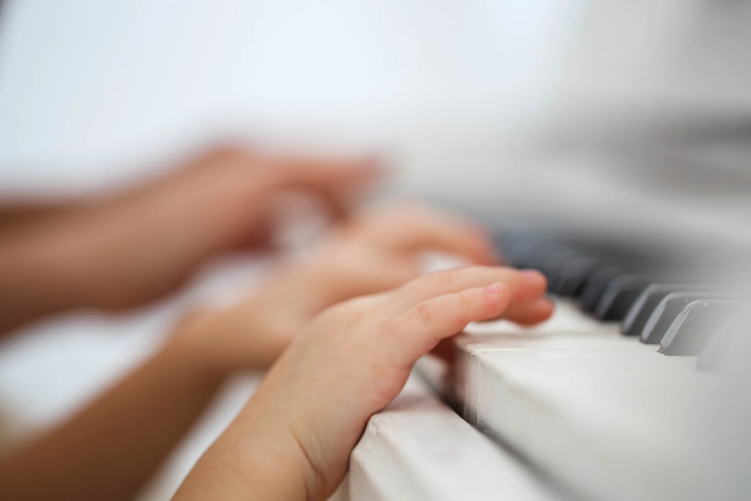 child-s-fingers-put-piano-keys.jpg