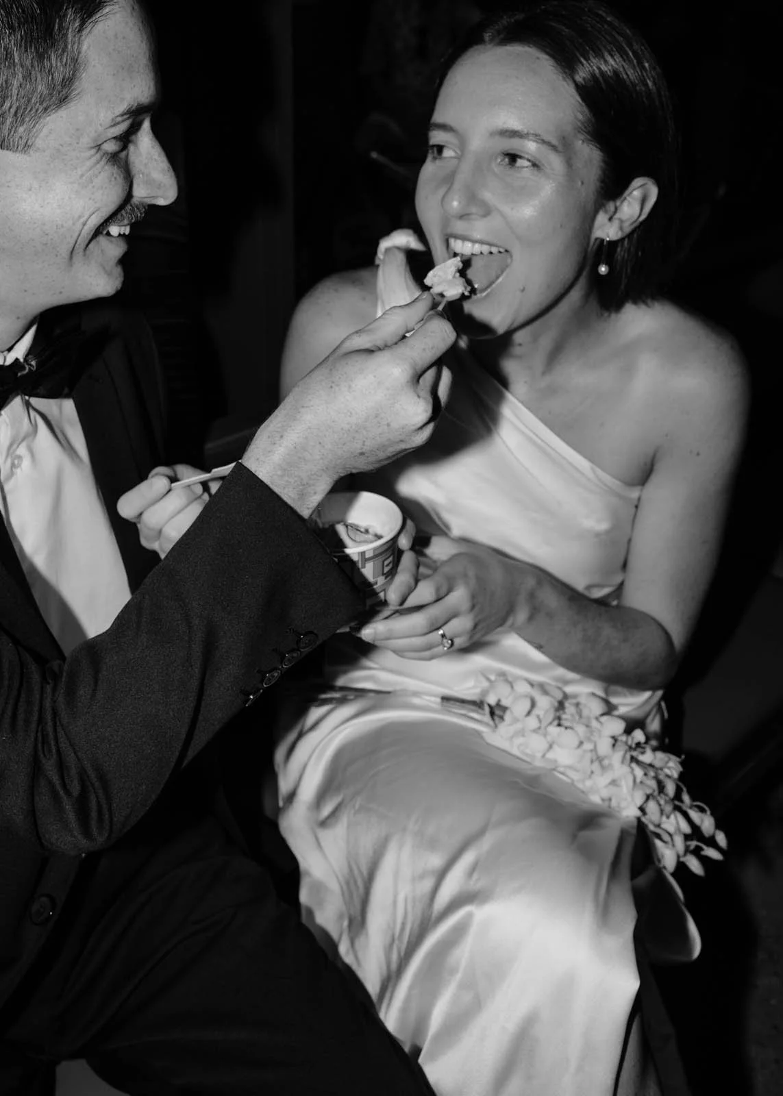 brisbane-wedding-photographer-reception-candid-feeding-each-other.jpg
