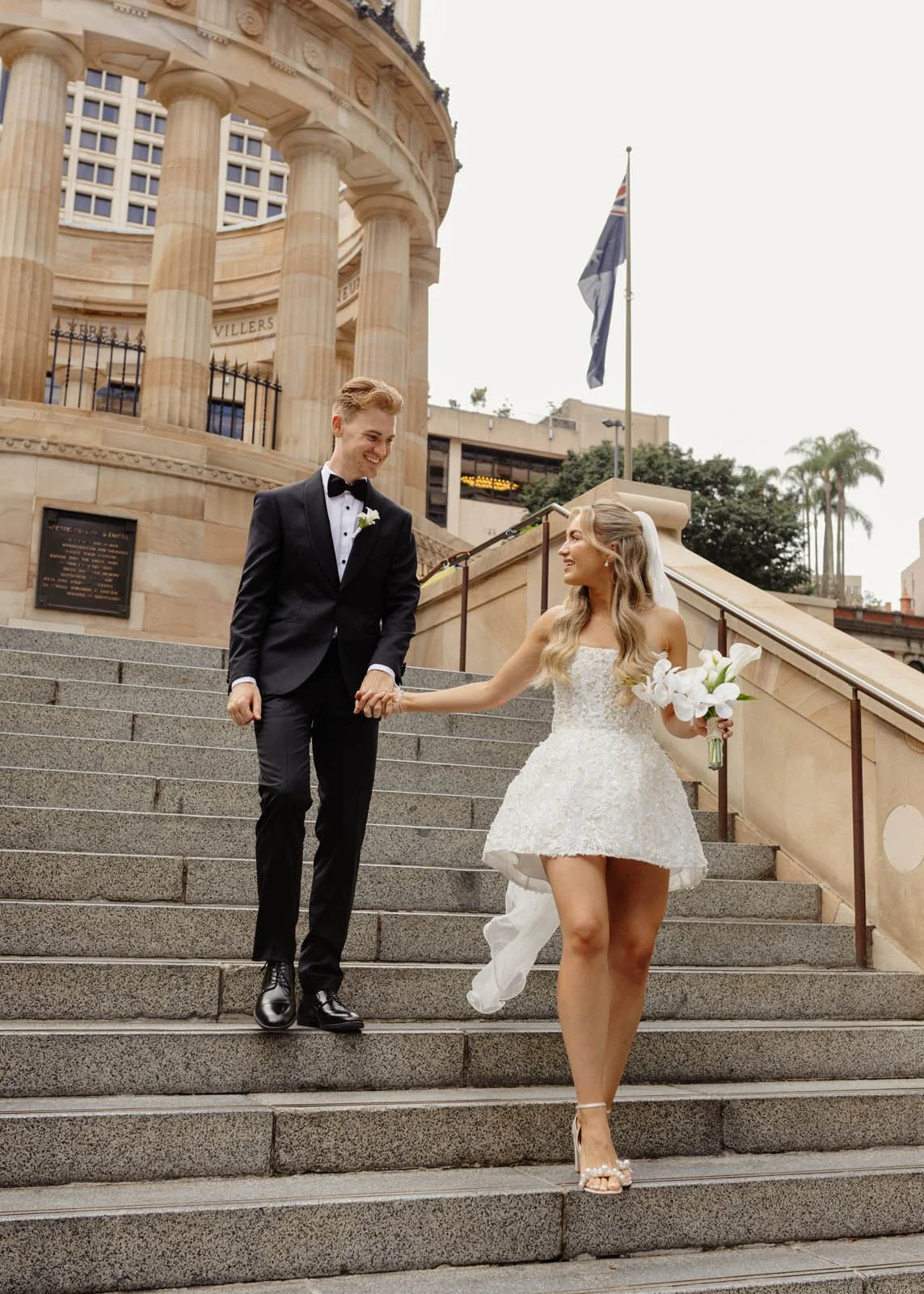 brisbane-wedding-photographer-couple-walking-after-ceremony.jpg