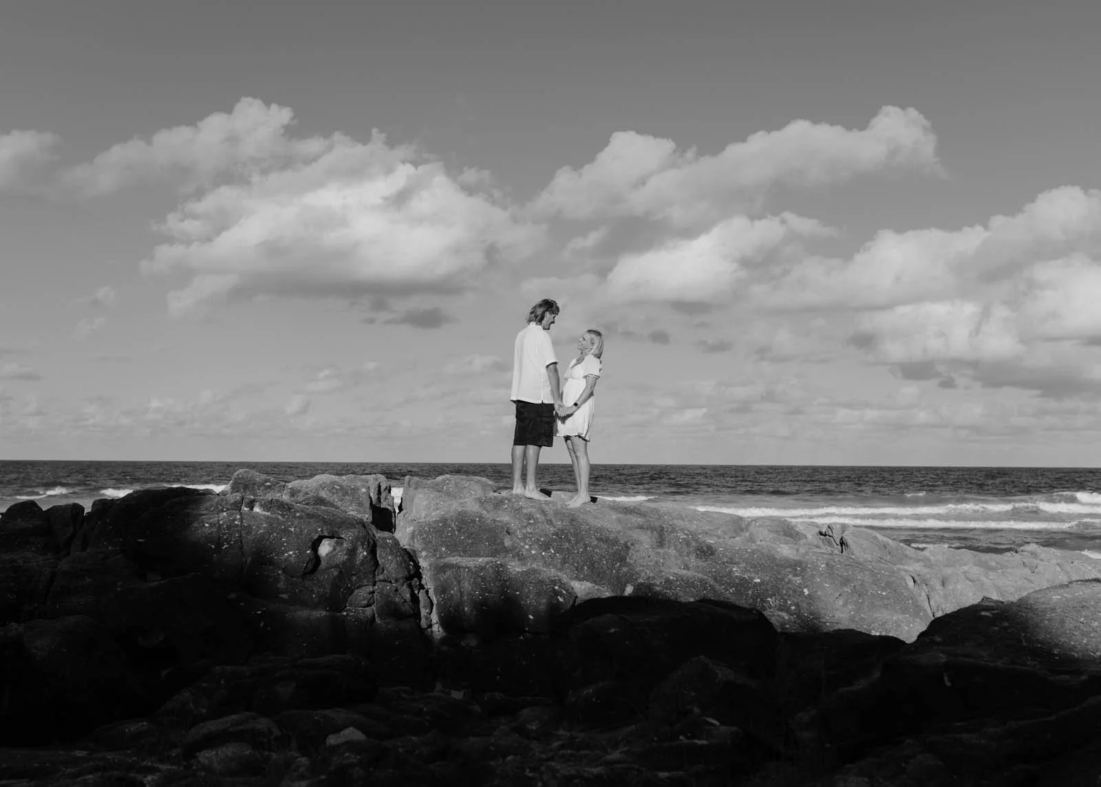 brisbane-couples-photographer-ocean-rocks-wide-black-and-white.jpg