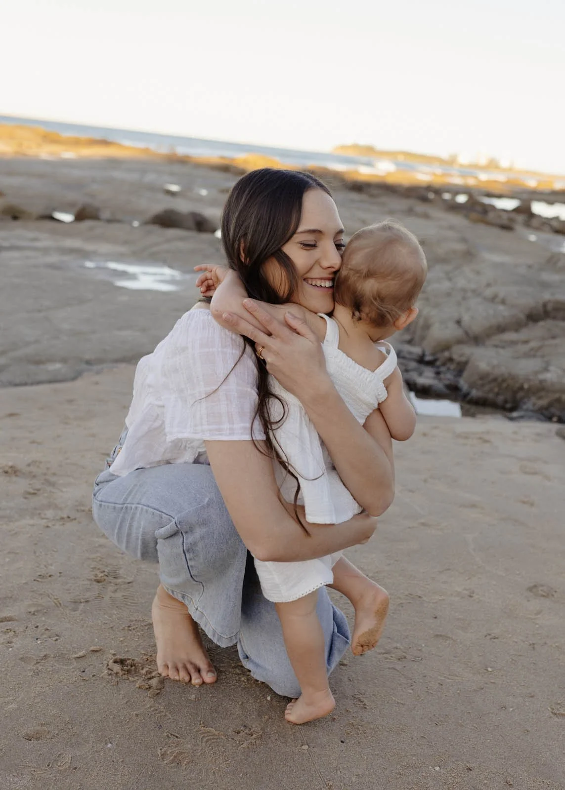 brisbane-family-photographer-mother-baby-embrace.jpg
