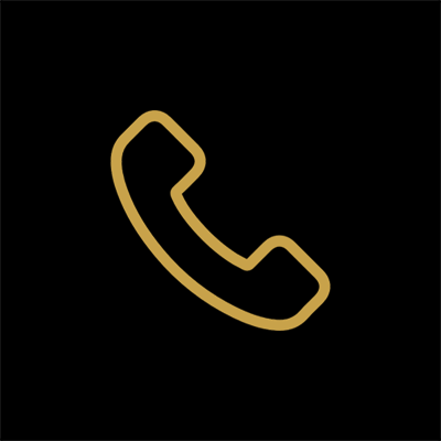 Neon outline of a classic telephone handset on a black background.